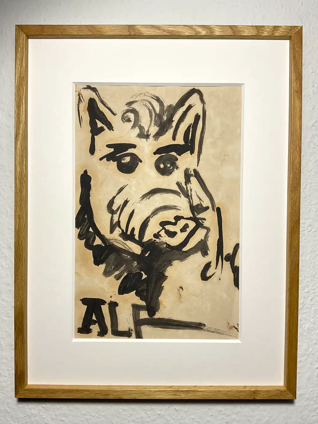 Framed drawing by Ruben Einsmann on paper showing a stylized animal face rendered in black ink.