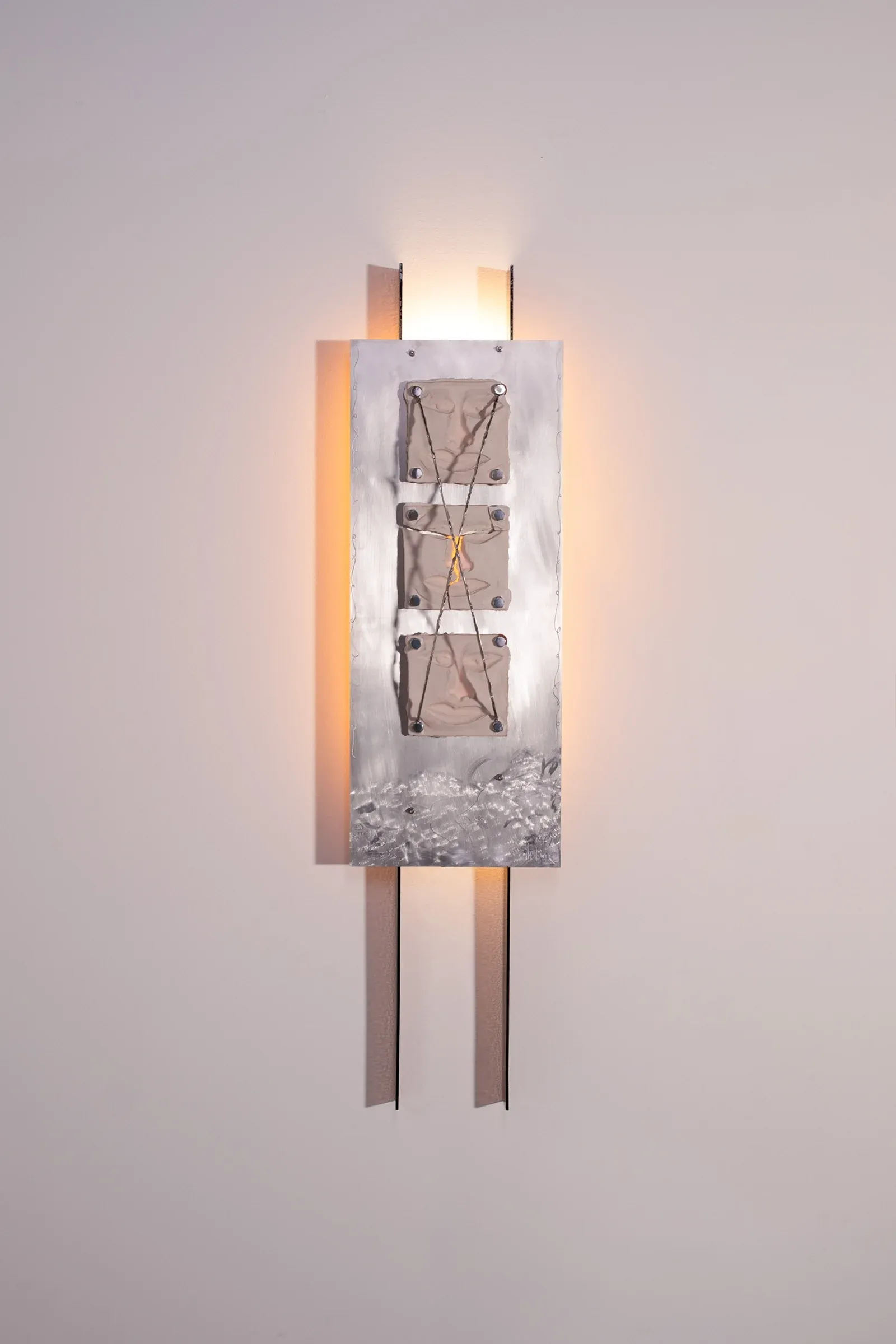 Alexander Kaye, Lighting Sculpture #02, vertical wall-mounted aluminum light sculpture with engraved panels, porcelain elements and steel hardware illuminated by integrated lighting.