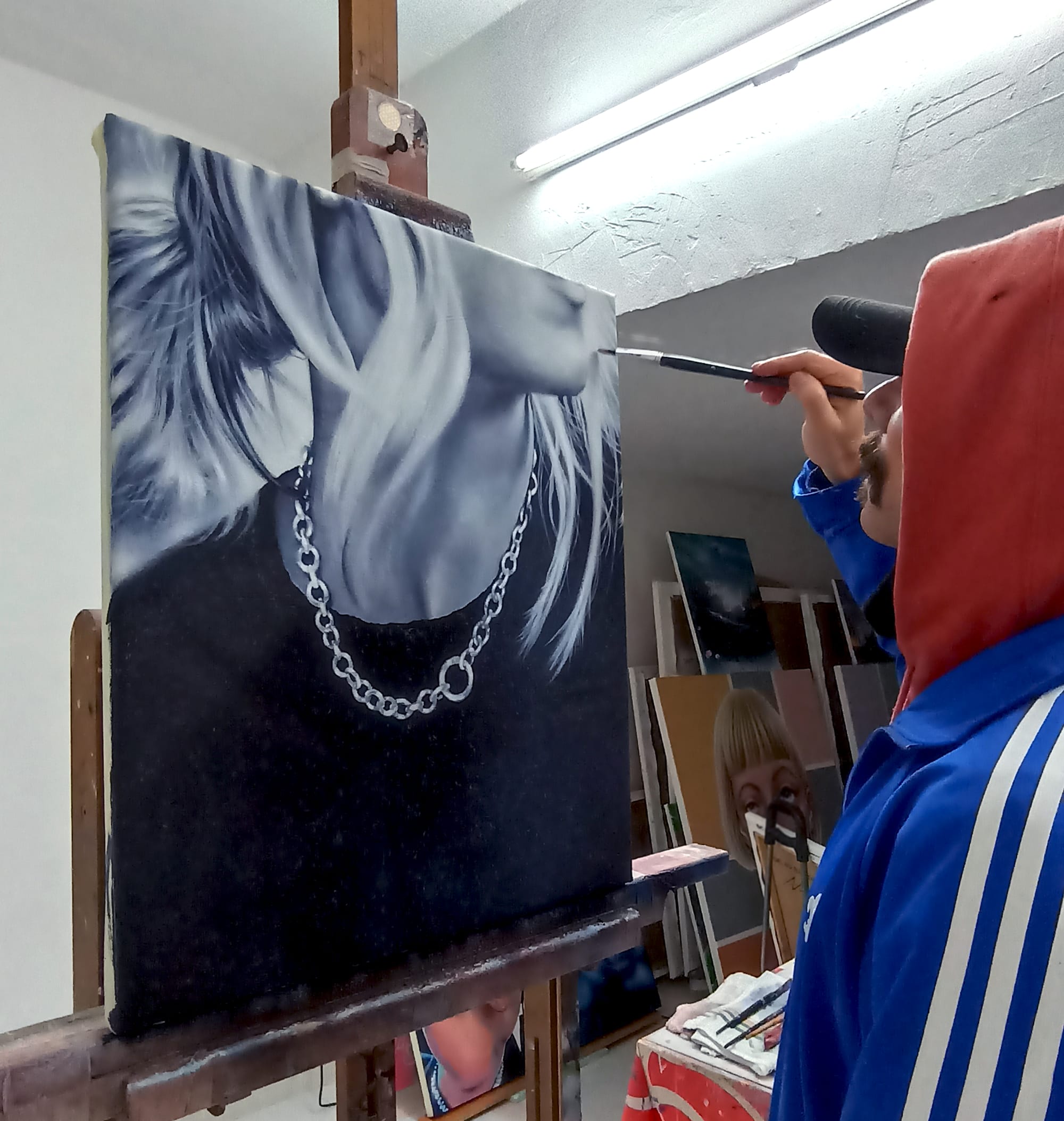 Angelo Volpe in his studio , figurative painting, monochrome , new painter from Italy on catapult munchies art club with an interview by DiFranco