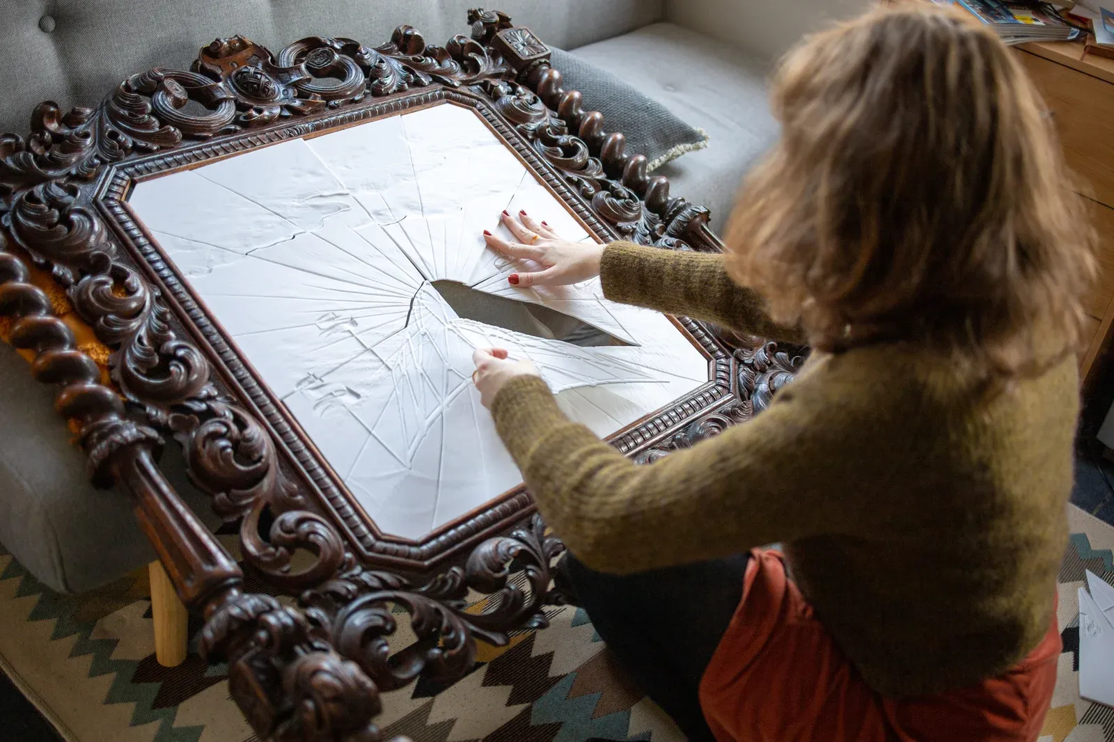 Martha Kicsiny studio detail with works referencing screens, nets and architectural enclosures.