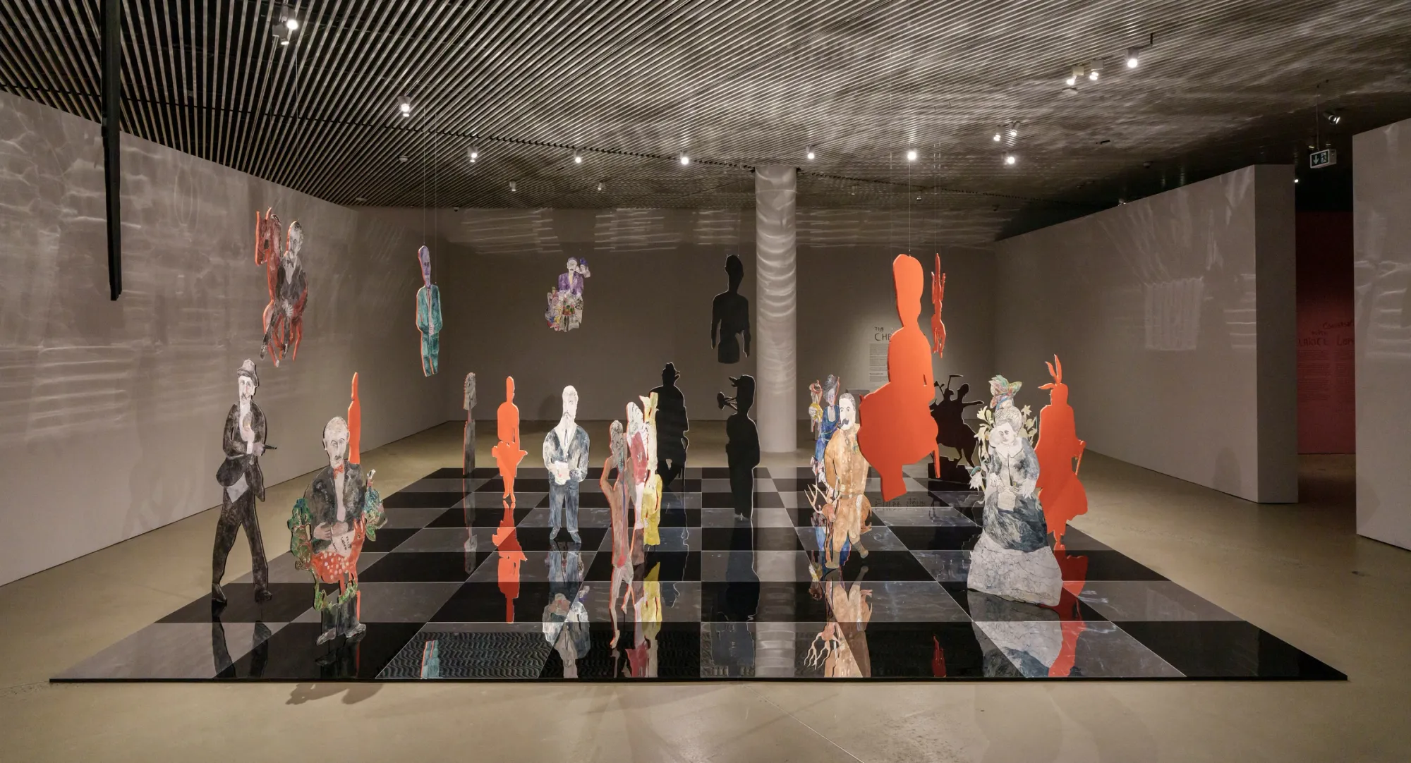 Anna Boghiguian The Chess Game, 2022 Mixed media installation: chess pieces, paint, shadow composition