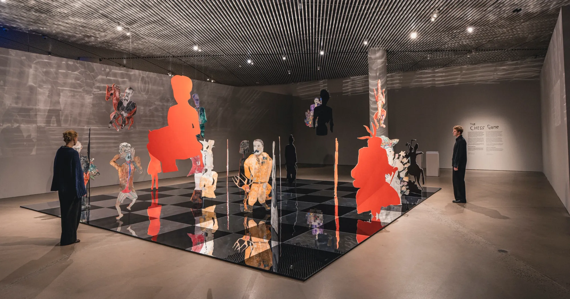 Anna Boghiguian The Chess Game, installation view at Aros Museum for contemporary art: chess pieces, paint, shadow composition