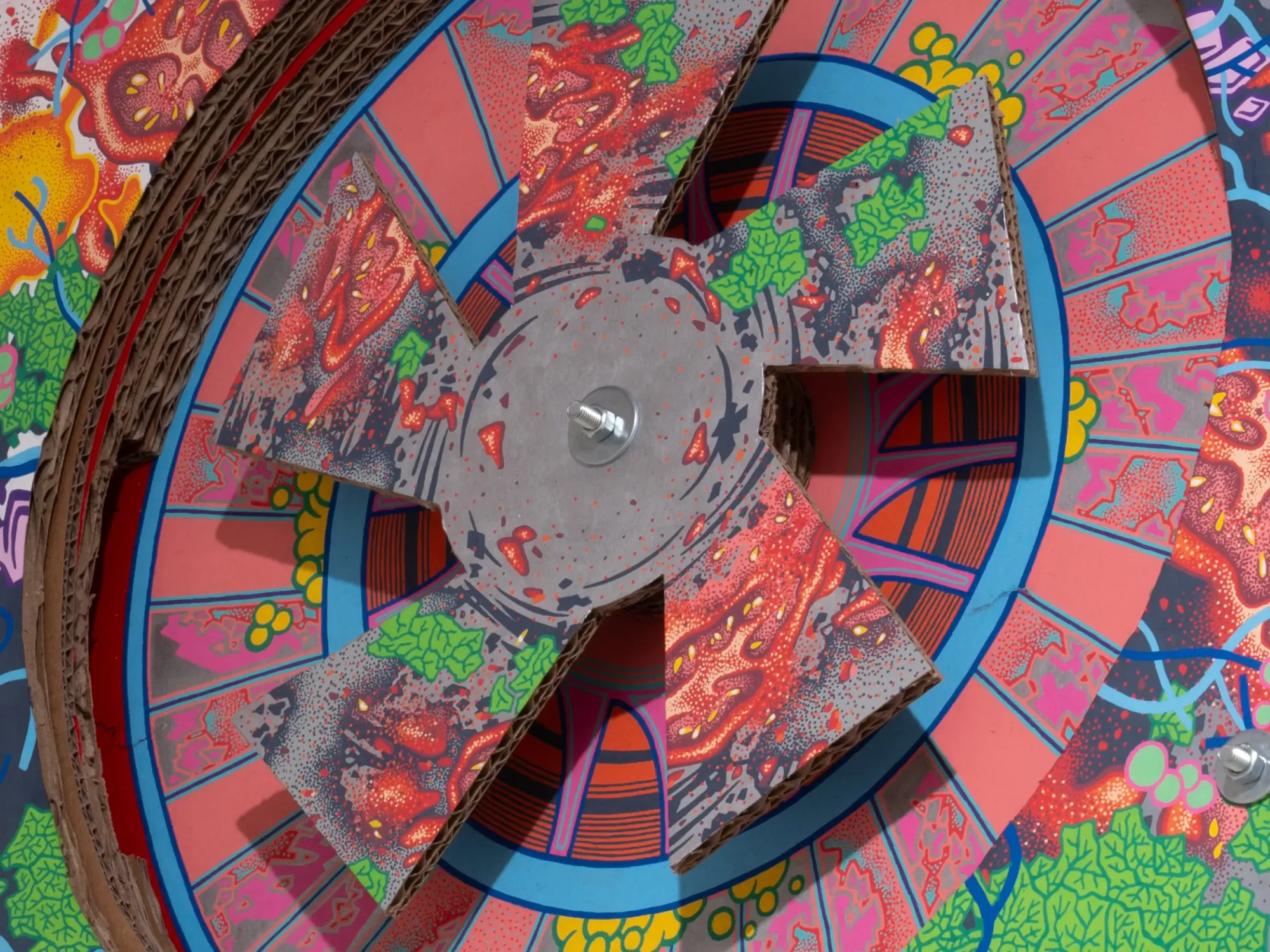 Close-up of colorful cardboard sculpture with hand-stippled drawing, bold graphic patterns and cut-out fan-like structure, Daniela Ponomarevová Temple of Health detail