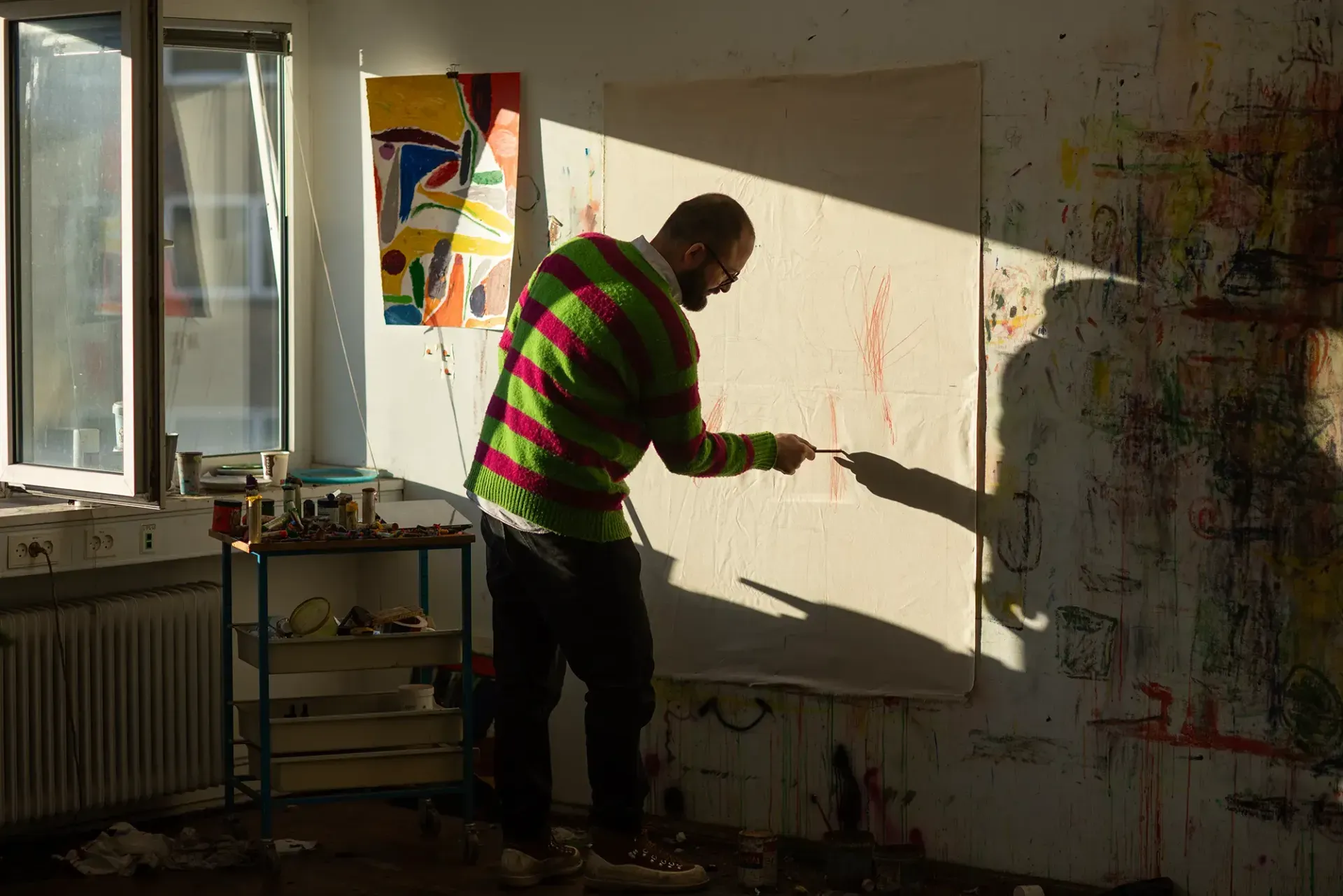 Artist Feature: Sune Christiansen in his studio painting 