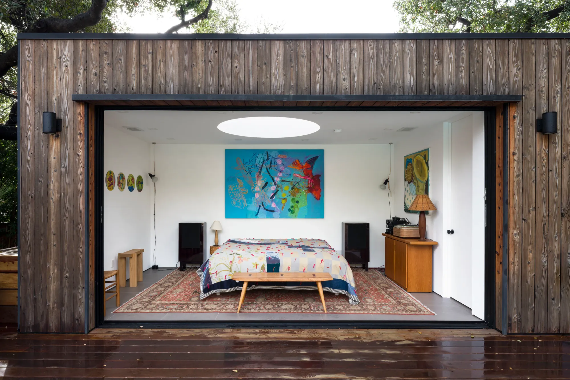 Installation view of the exhibition Dinner Table at Simchowitz featuring paintings by Andrey Samarin and Lera Derkach displayed in a modern bedroom interior setting.