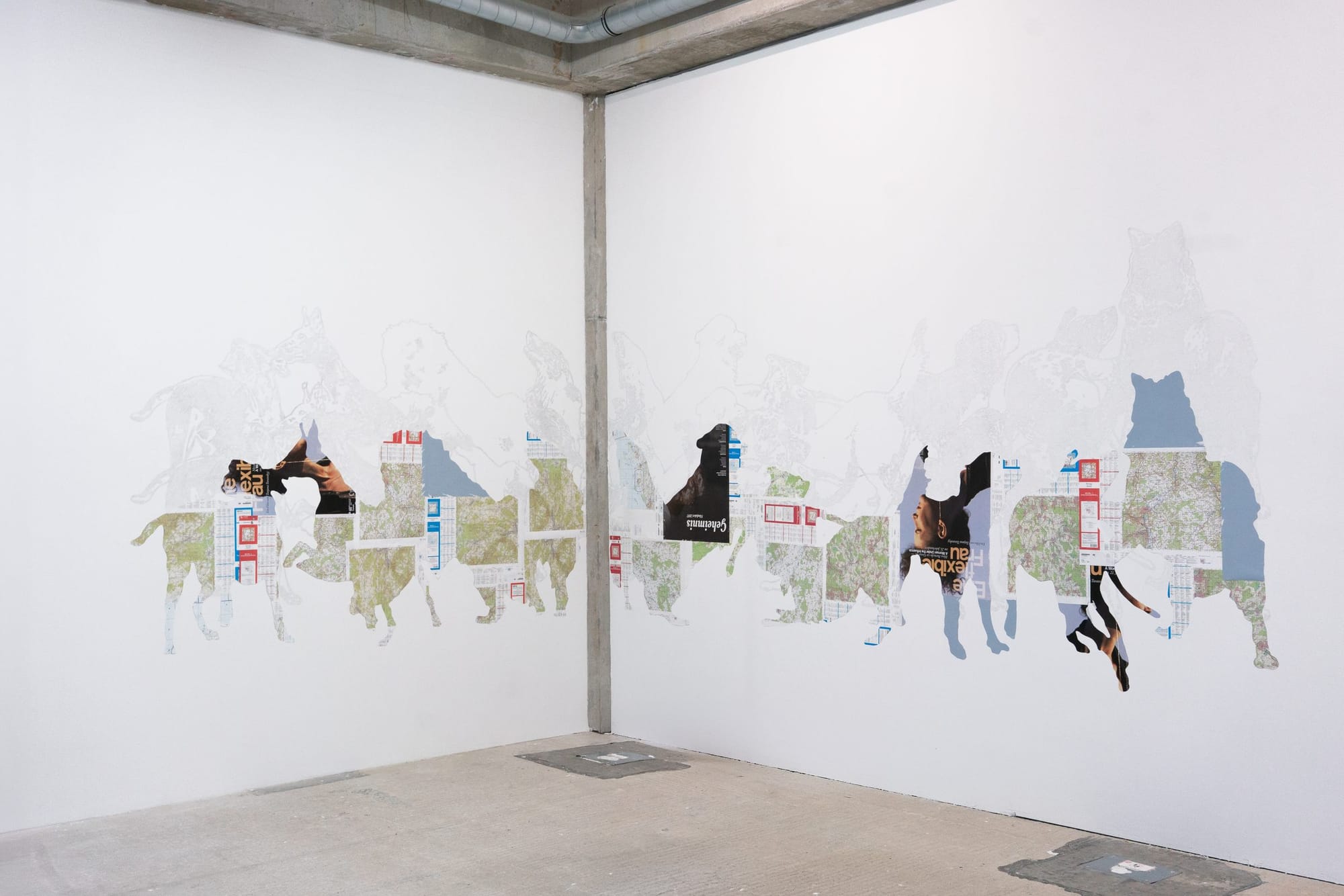 Stasia Grishina wall installation with dog shapes made from maps and printed fragments contemporary art Germany