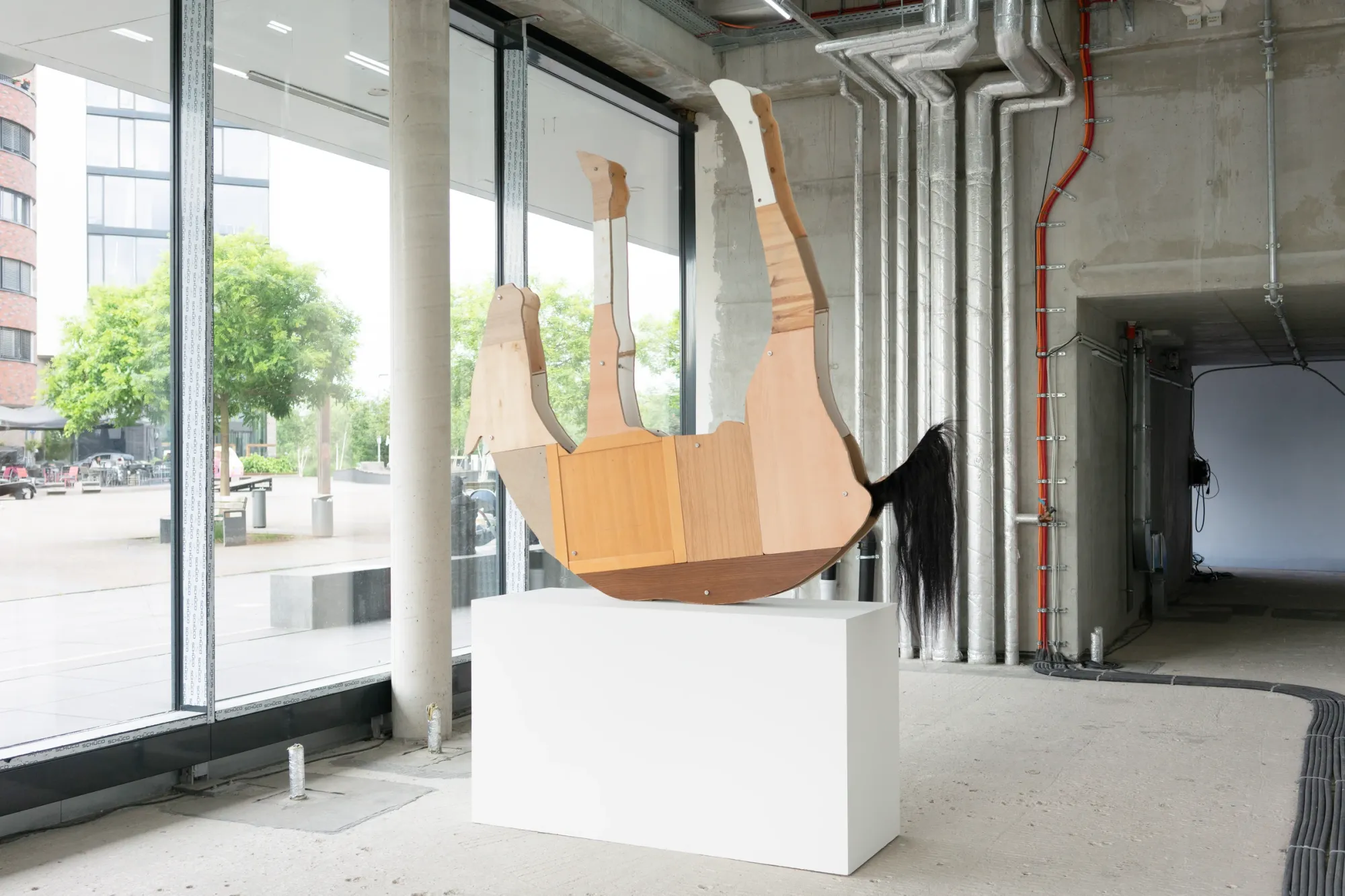 Stasia Grishina The Ballad of the Fall 2024 wooden panel sculpture with horse tail Hafenspace Offenbach Artist in Focus by Catapult