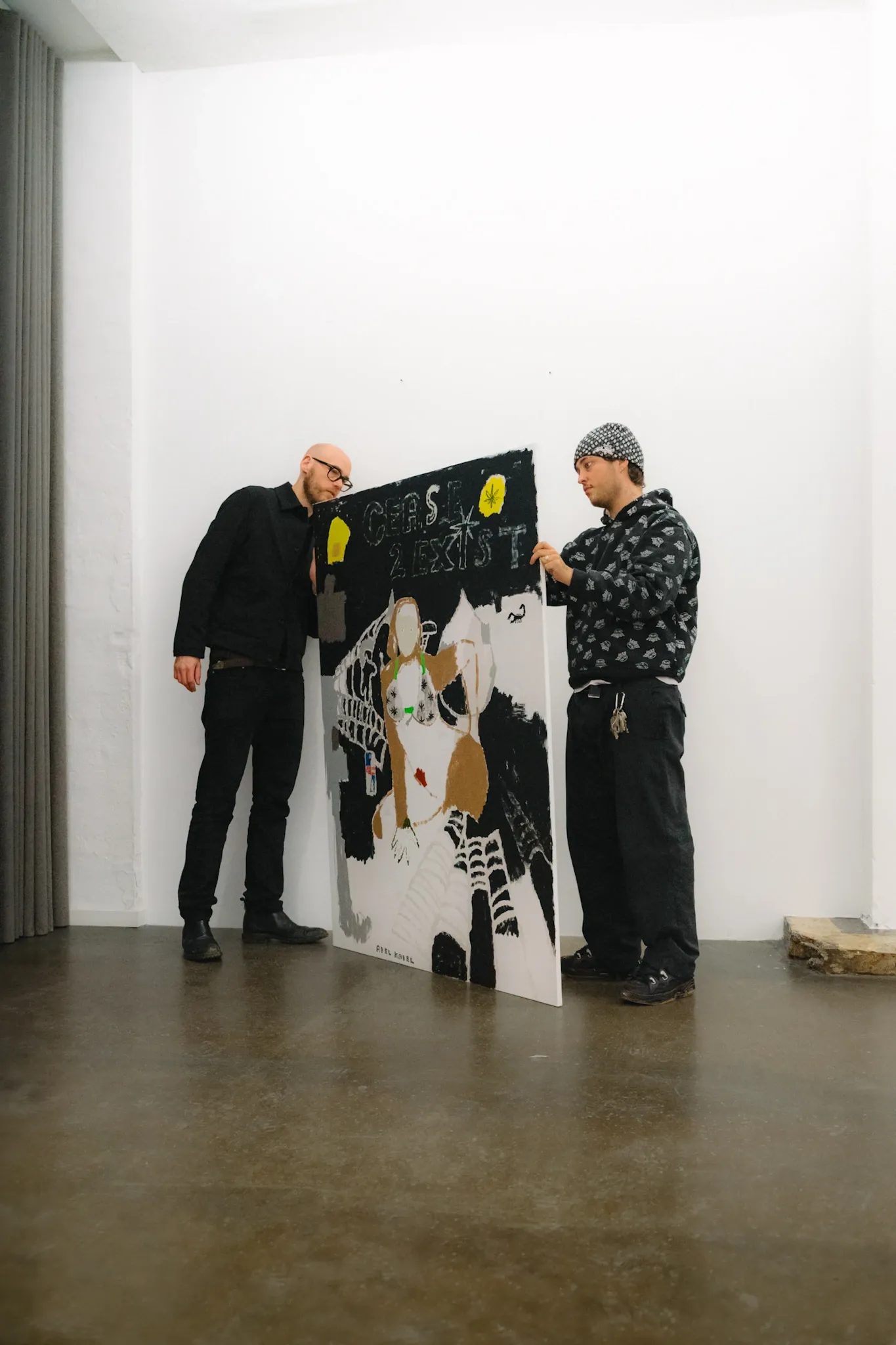 Abel Kabel GOT GUTS 2026 artist in gallery with painting installation in progress Aarhus Jacob Bjorn Gallery