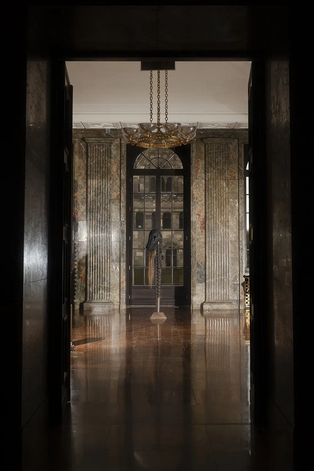 Jan Baszak installation view Letztraum sculpture head in architectural interior doorway ZAMEK Poznan Filip Preis