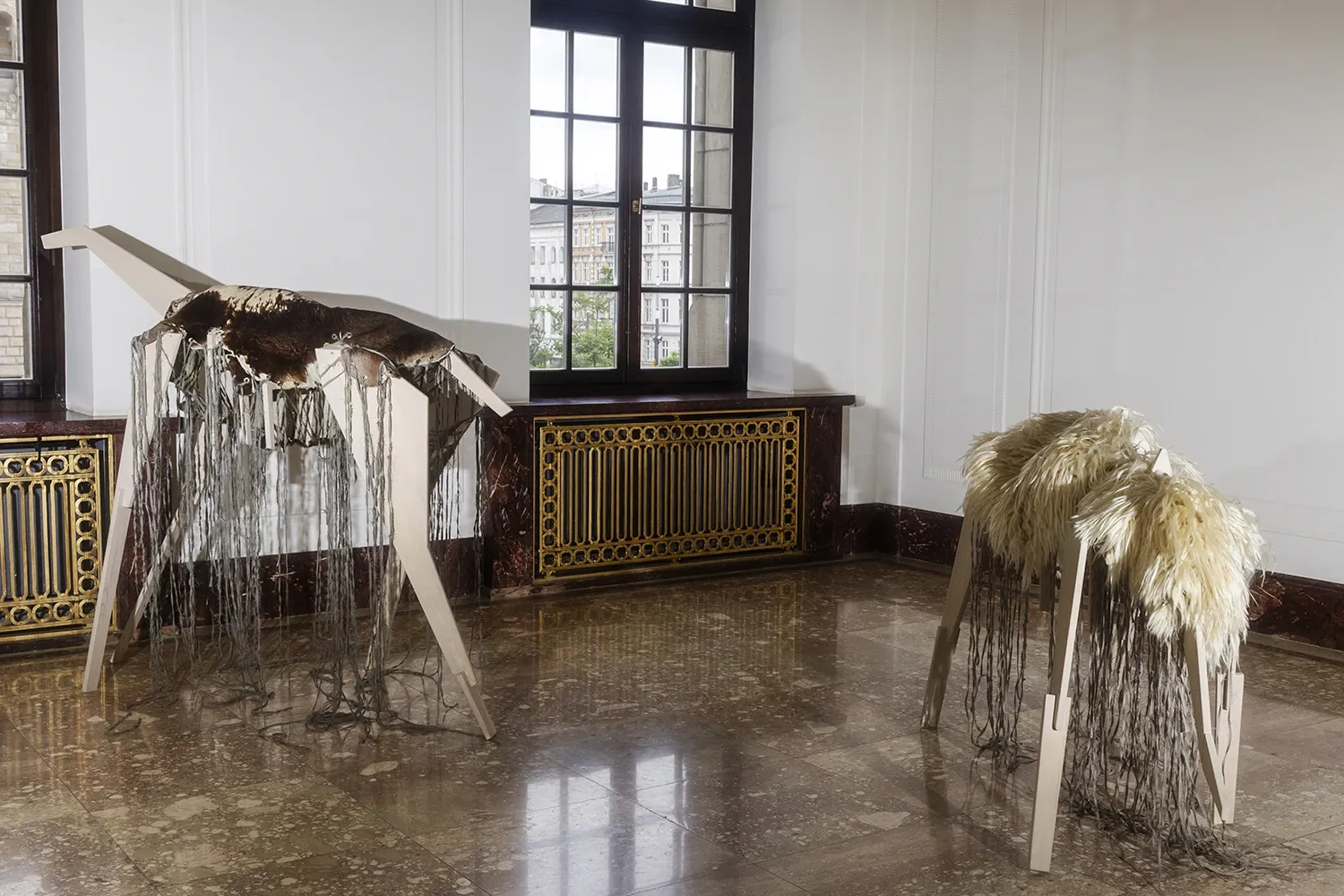 Jan Baszak installation view Letztraum textile and wooden animal-like sculptures with cascading fibres ZAMEK Poznan Filip Preis