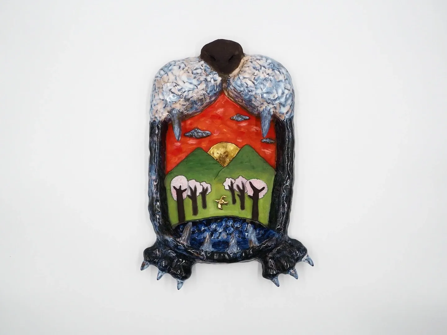 Jeyoon Ryu ceramic bird sculpture with inner landscape mountains trees gold sun glazed ceramic Kyoto