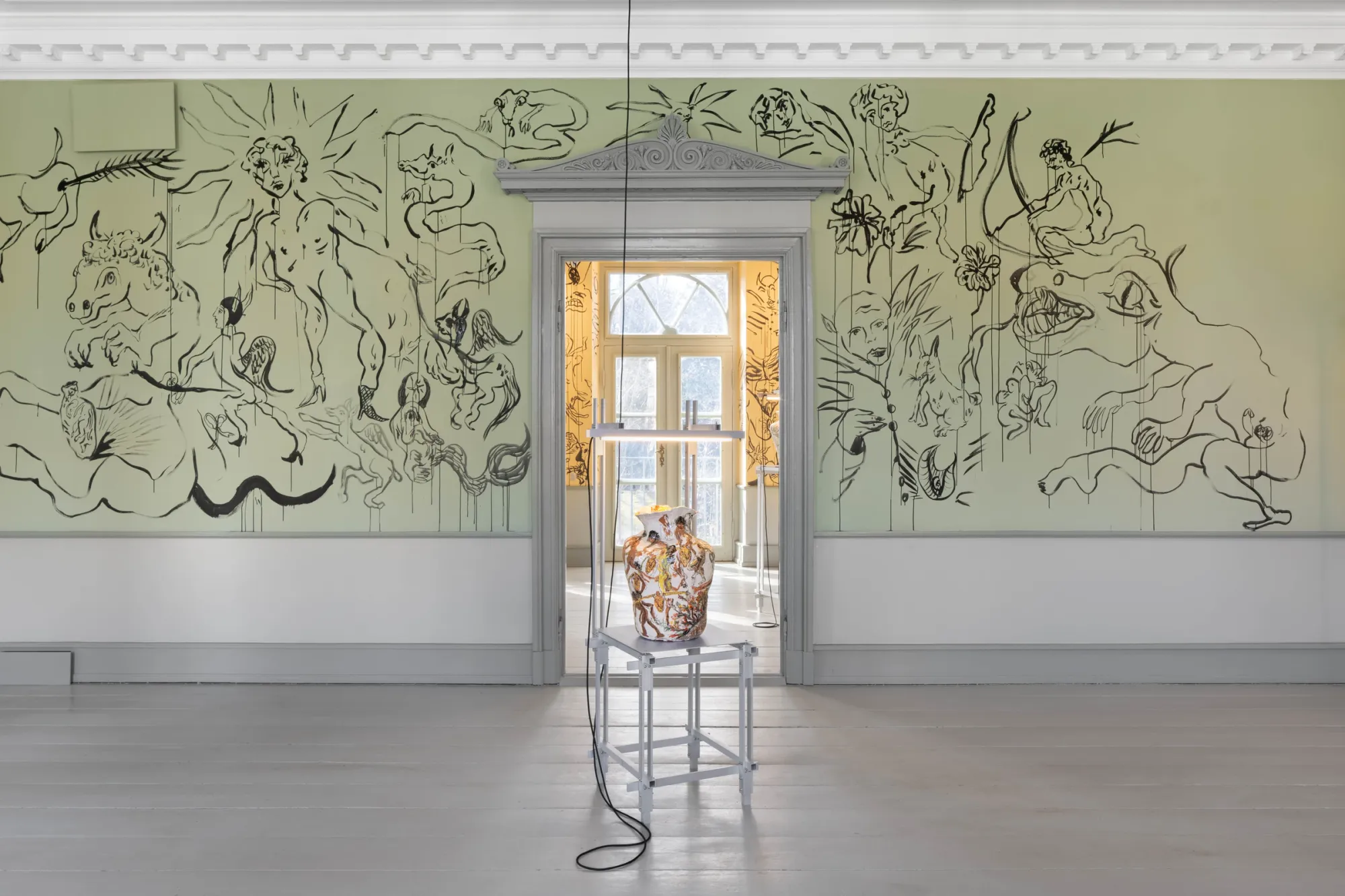 Karim Boumjimar installation view Bodies Under Construction Møstings Frederiksberg green wall painting hybrid figures ceramic sculpture scaffold light Denmark 2026