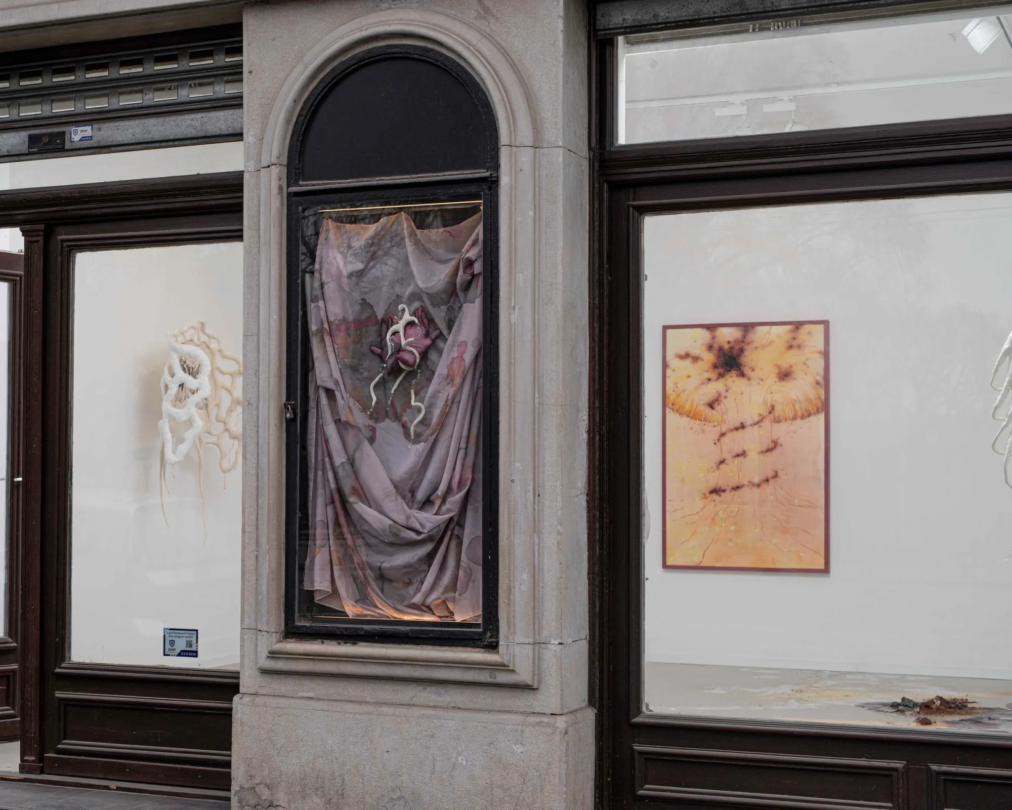 Archive of Contact installation view window Liget Gallery Budapest 2026 exhibition Csatlós Asztrid Metzing Eszter