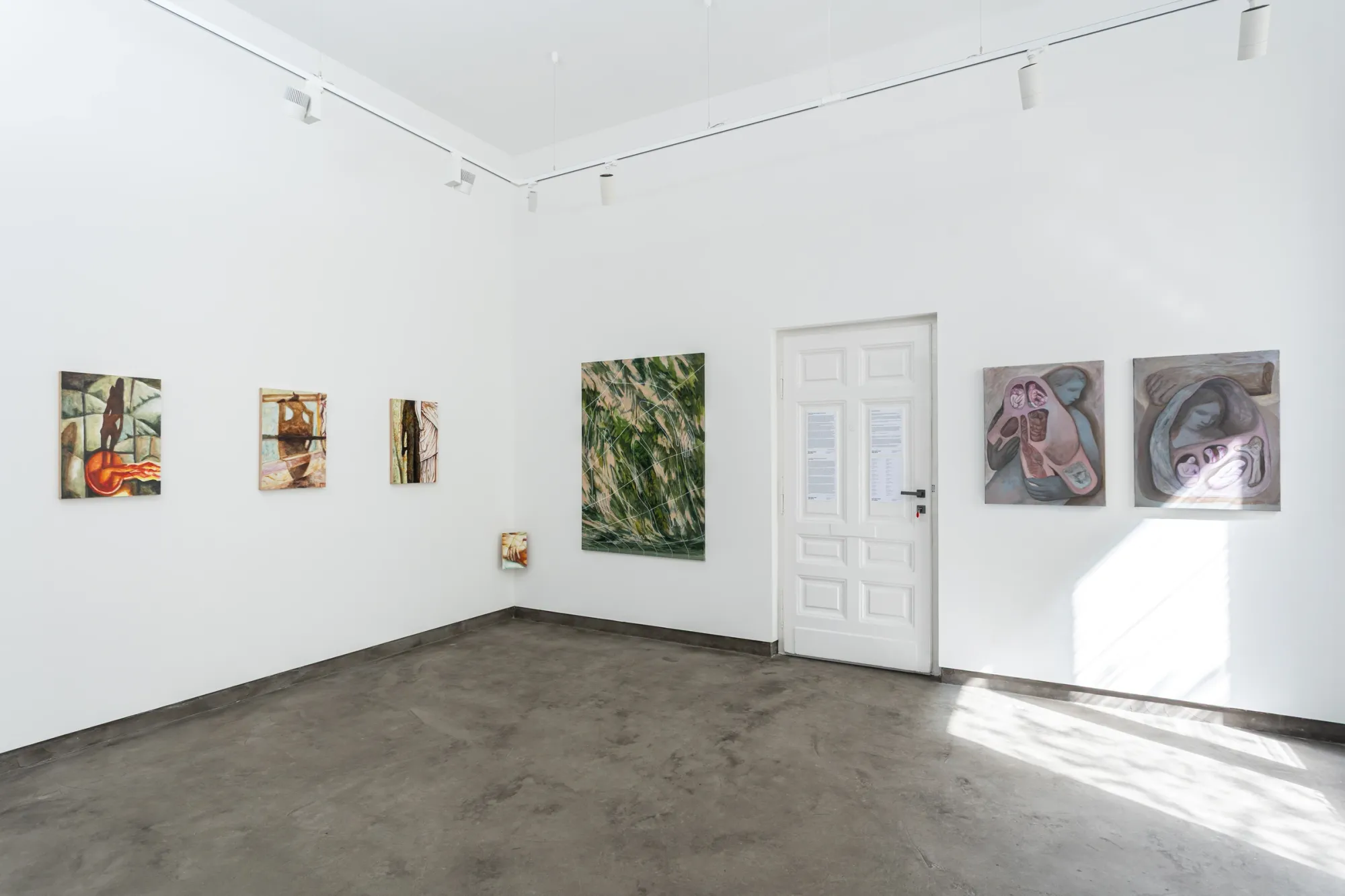 Exhibition view, Inner Spaces, Gallery Rechnitzer, Budapest, 2026, white gallery room with paintings by Júlia Csapó and Eszter Kálóczy arranged around a central door.