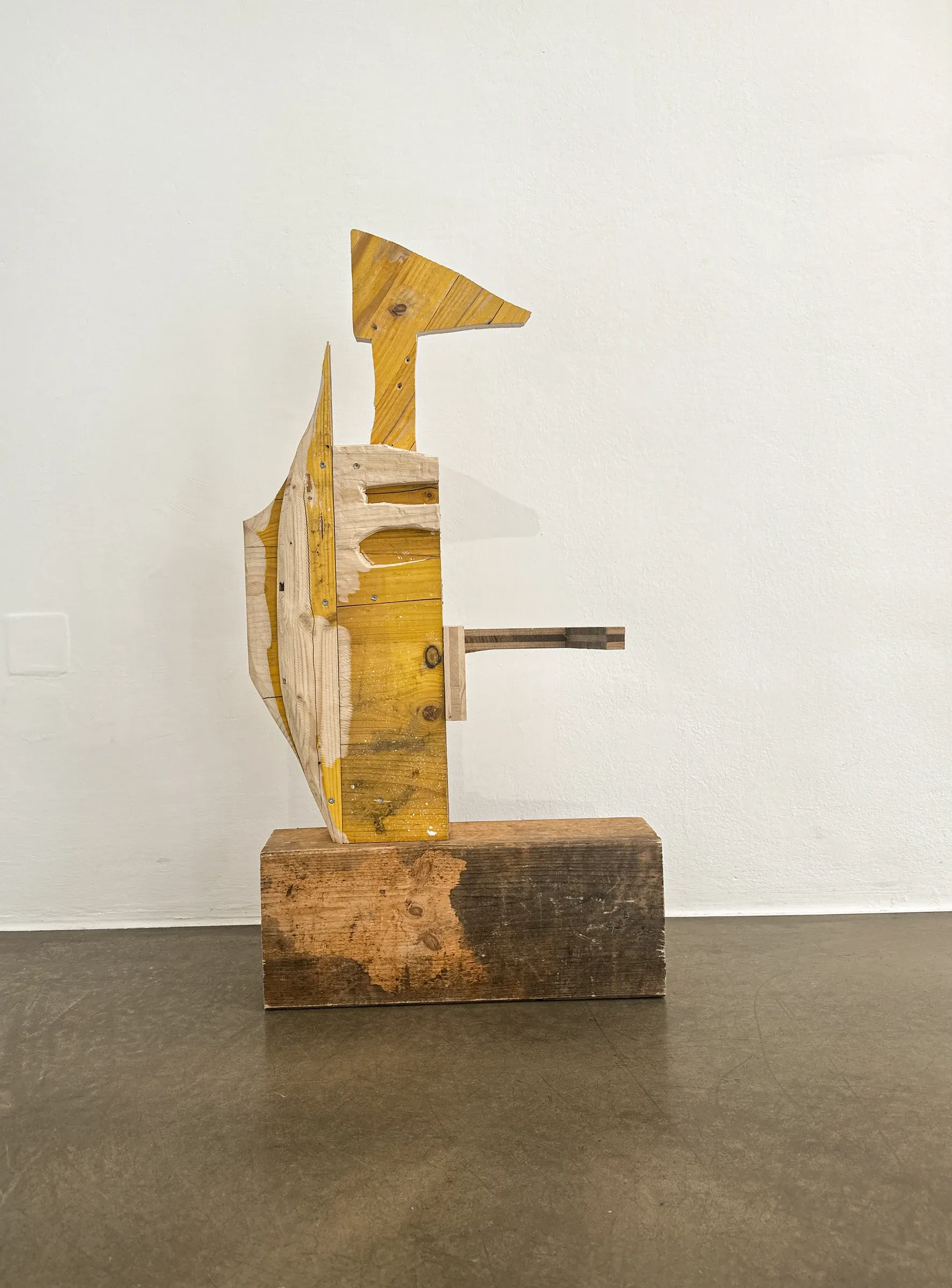 Ernst Koslitsch at Bildraum with a wood sculpture cosmic trigger