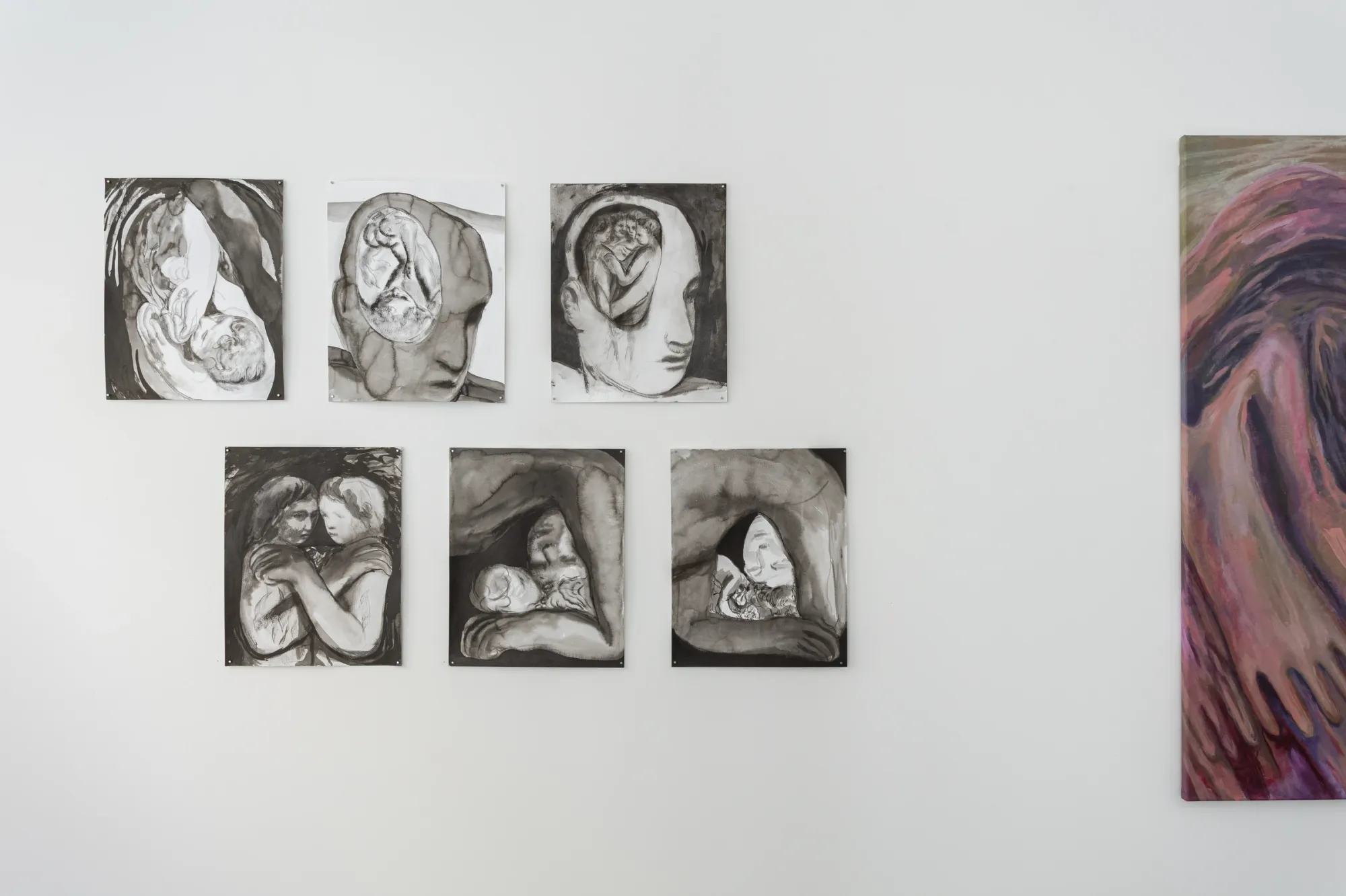 Gallery Rechnitzer, Installation view, Inner Spaces, Budapest, 2026, grid of black and white drawings by Eszter Kálóczy showing figures in enclosed bodily and cave-like forms.