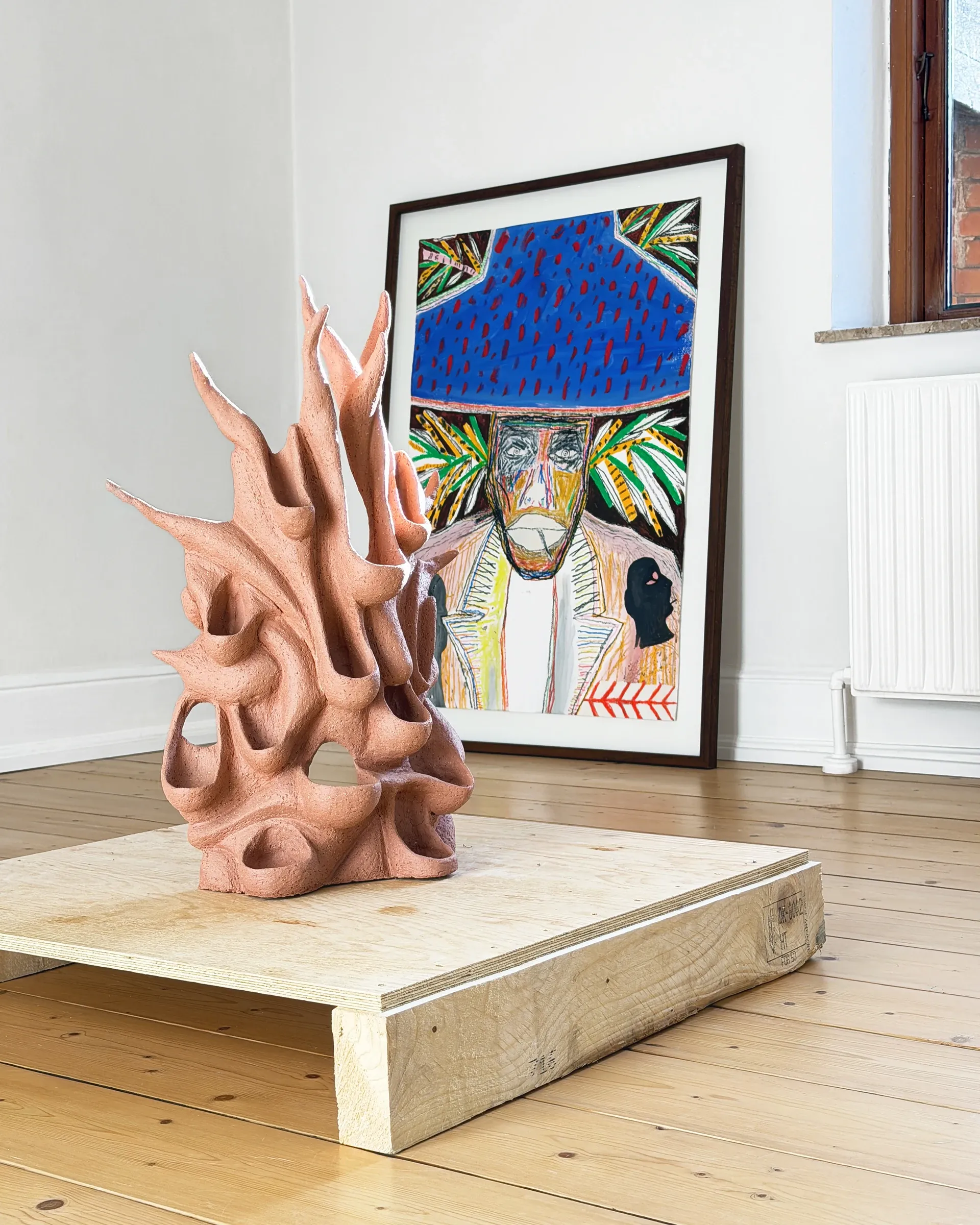 Gallery Fusion artists, Rune Lambrecht terracotta ceramic sculpture alongside Dino Cama framed drawing, Grihodda,