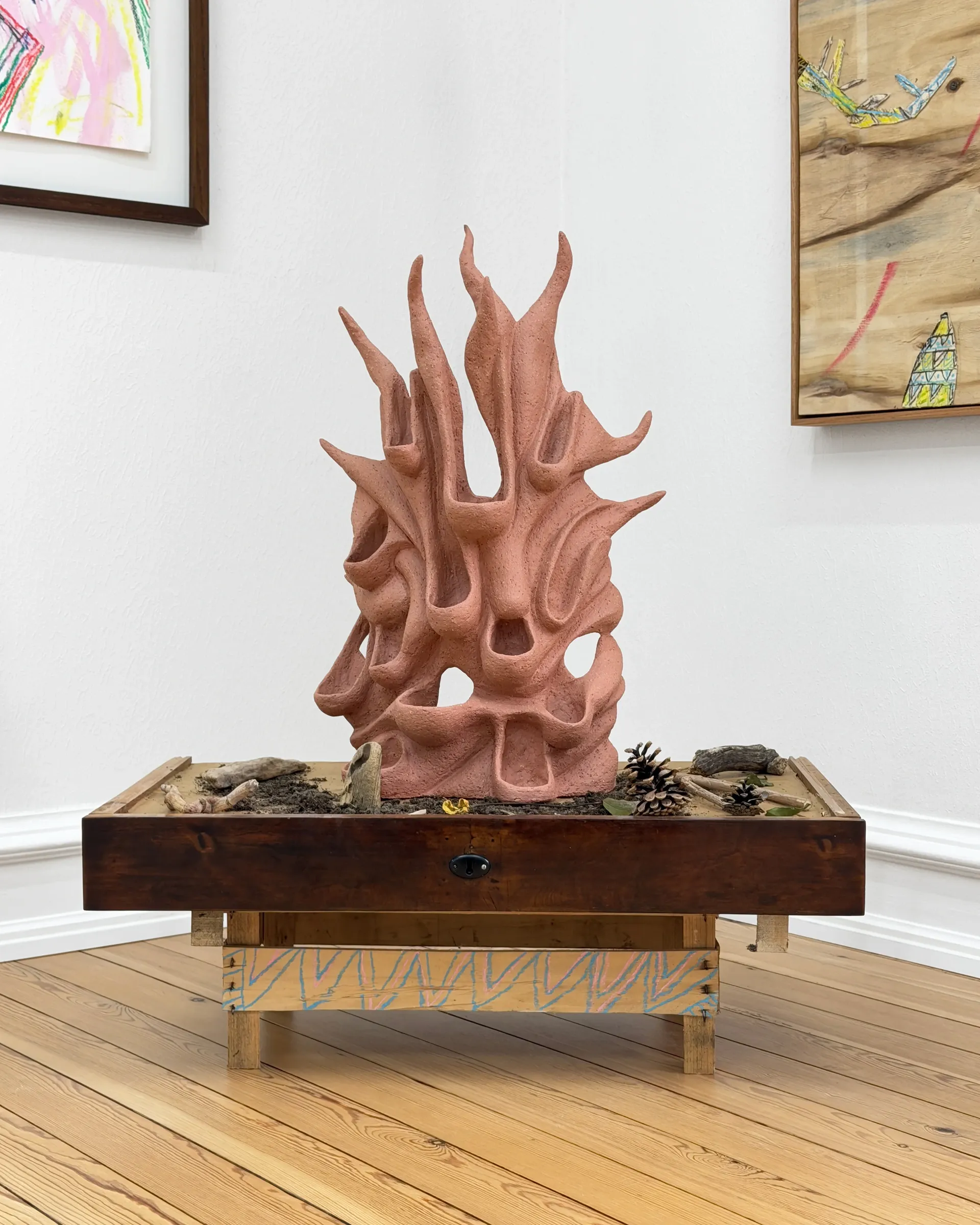 Rune Lambrecht large terracotta flame sculpture in wooden box with soil, pine cone and natural materials, Grihodda, Gallery Fusion