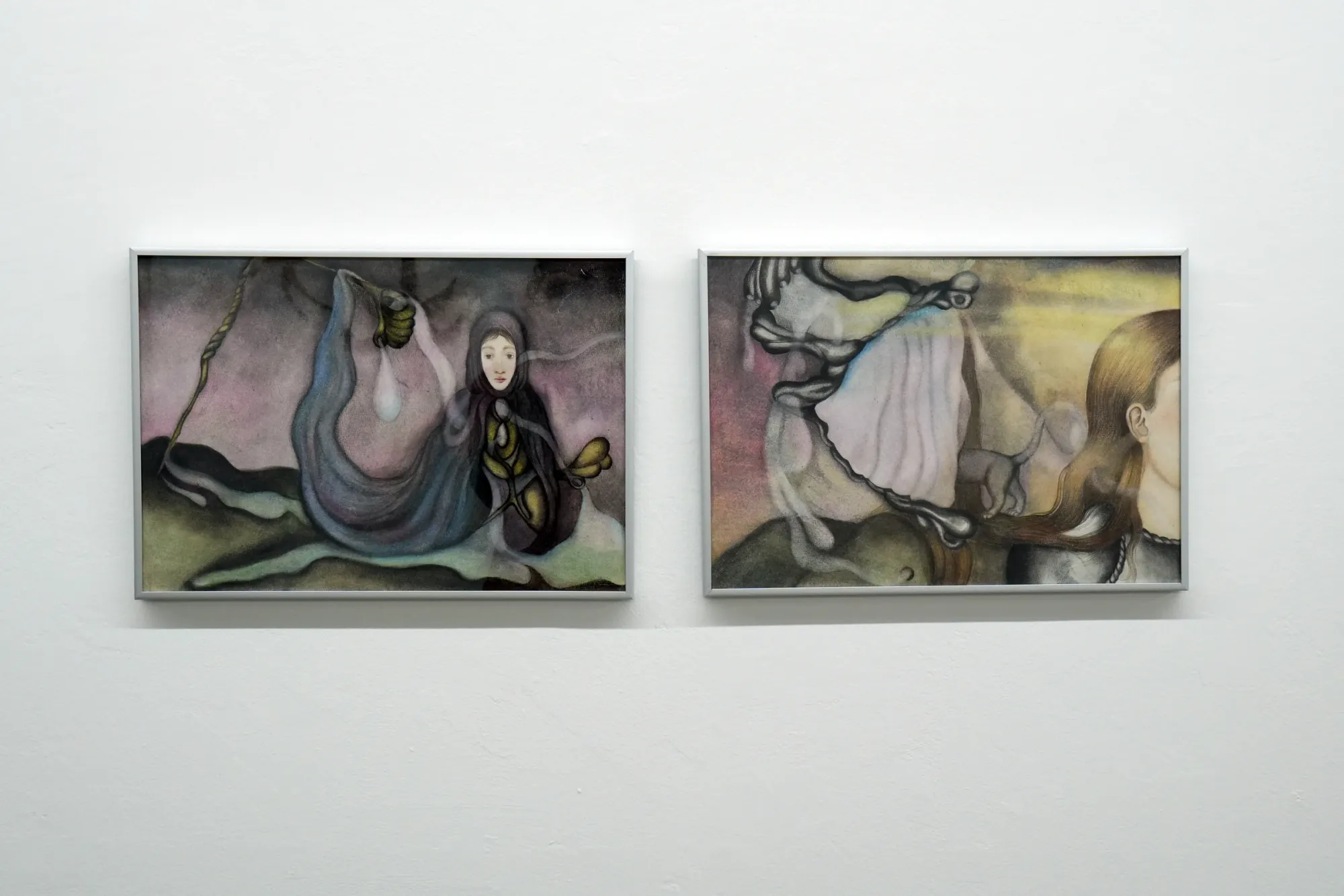 Nata Varazi, The Ouroboros II, 2025 — framed drawing on paper depicting a surreal female figure with elongated organic forms and muted tones; watercolor pencil, oil pastels and pencil on paper; The Why Not Gallery at Fabrika Project Space, Tbilisi.