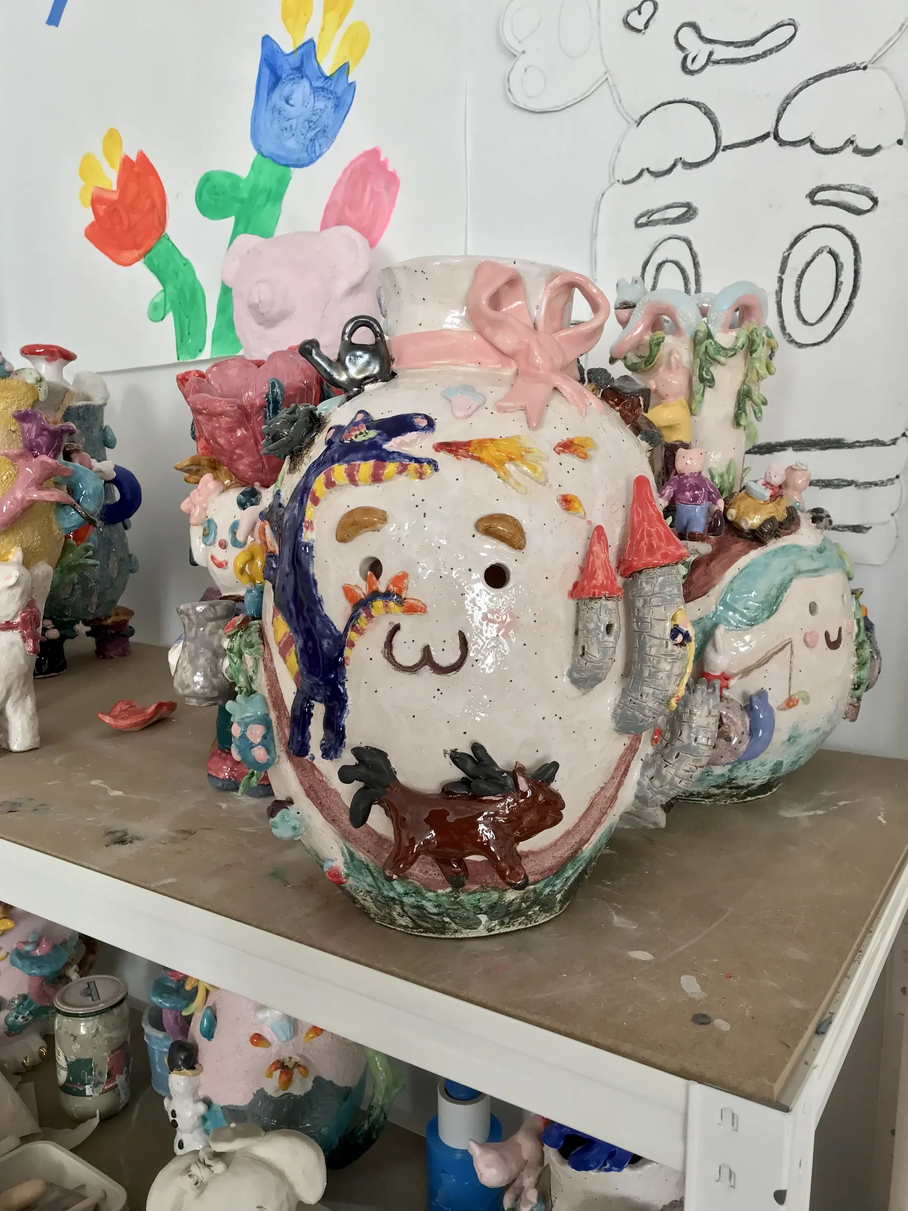 super future kid, painting as image, in her studio