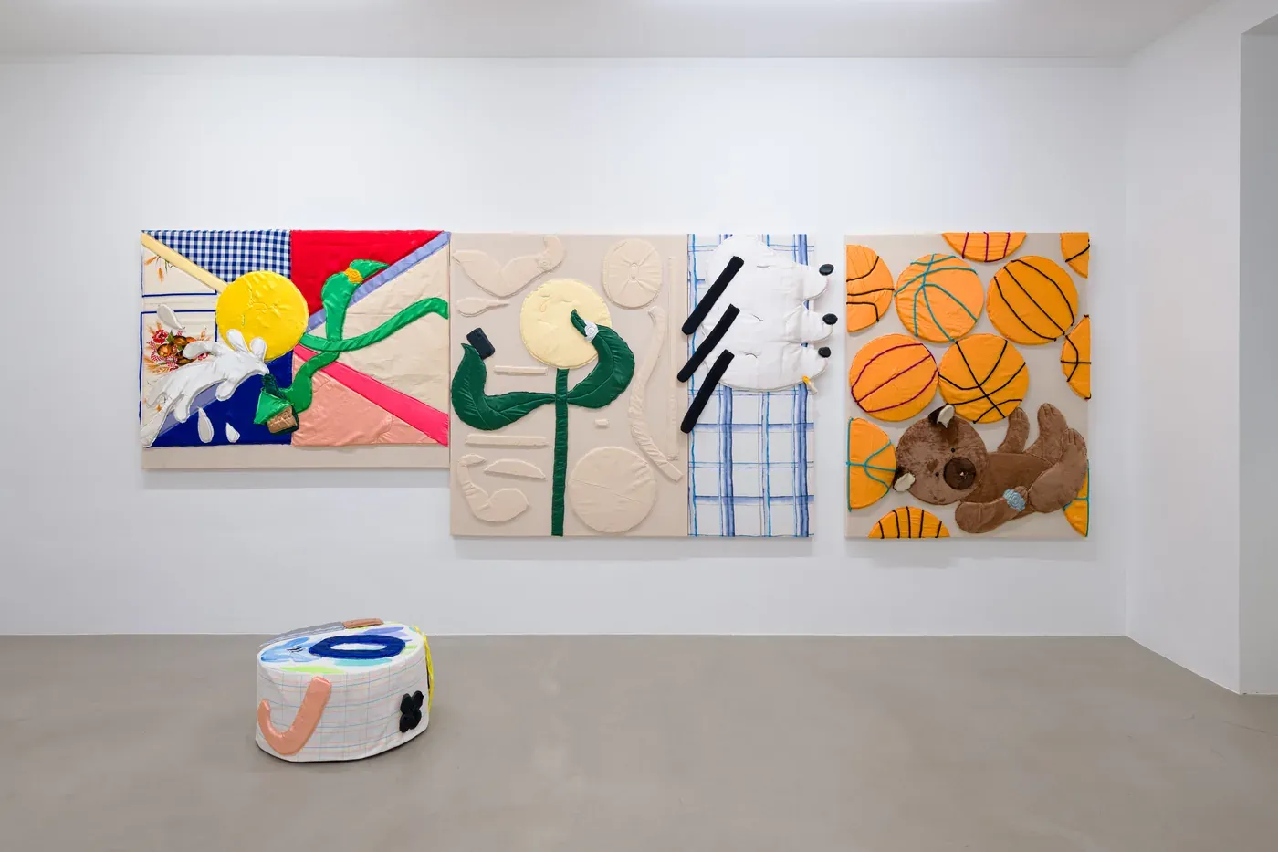 Exhibition view, Lovers, Daniel Ferstl, 2022, three large textile canvases with pouf sculpture
