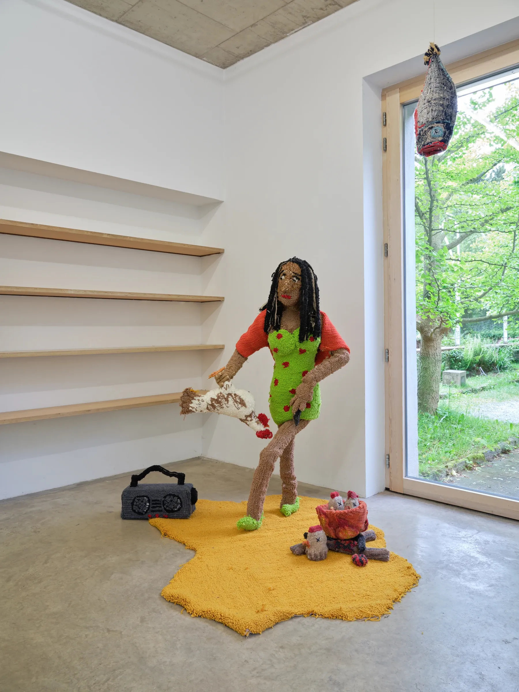 Elen Braga, Ich bin wie du, NAK Neuer Aachener Kunstverein, Aachen, 2026, hand-tufted textile sculpture of grandmother cooking over open fire