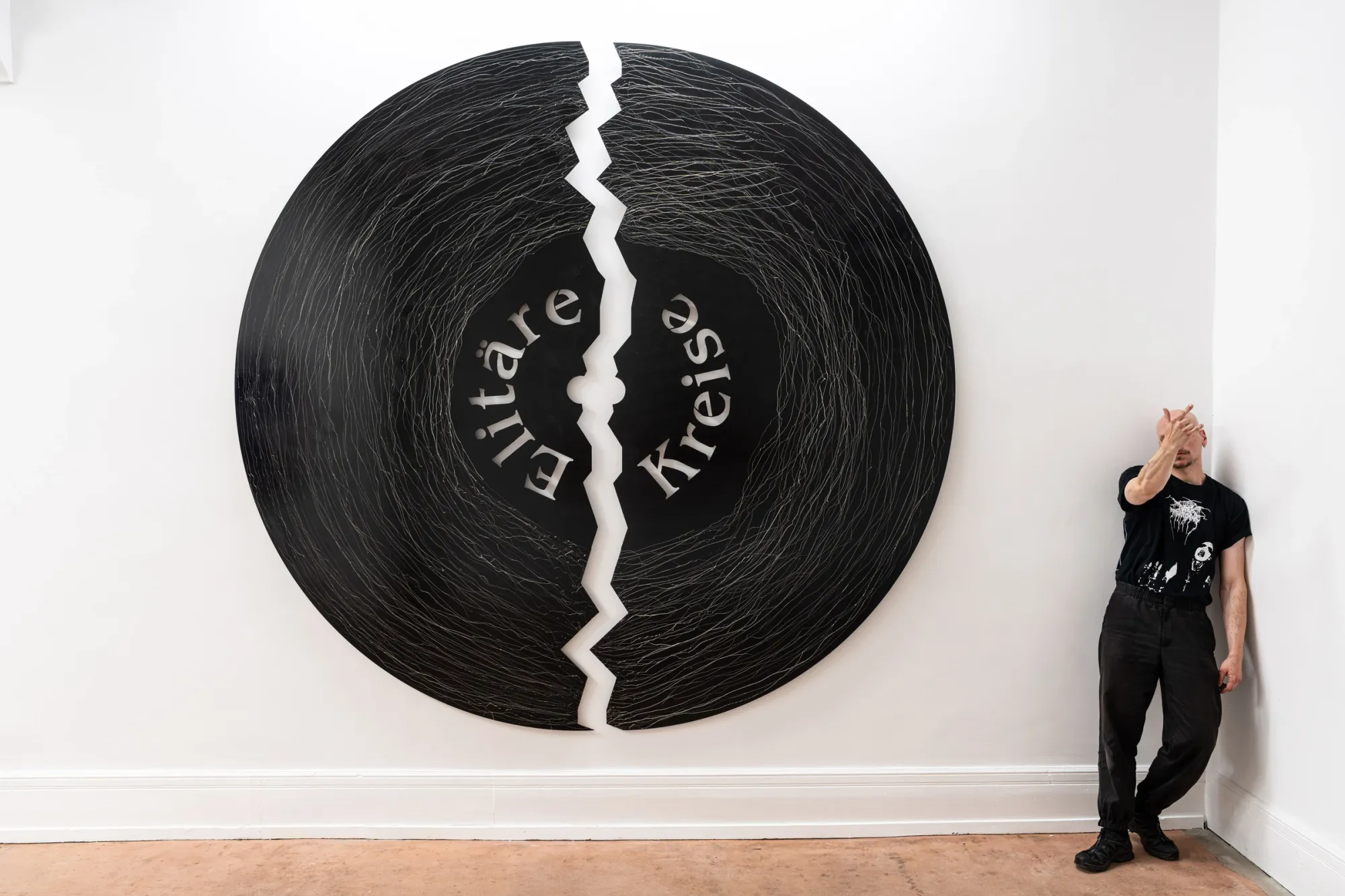 Joschua Arnaut, artist in front of his artwork at Galerie 3ap, Frankfurt