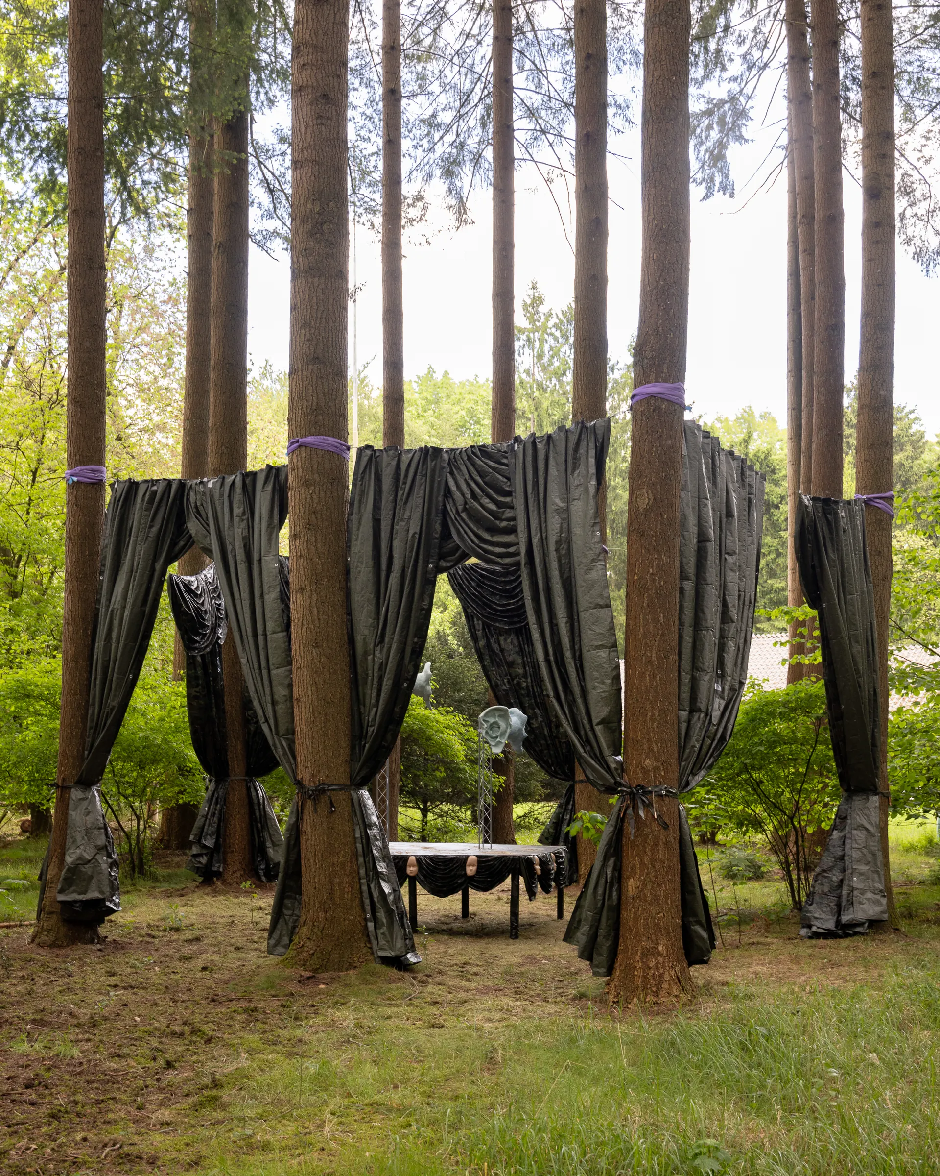 Katharina Busl, Nothing Up My Sleeve, PaltzBiënnale Soest 2026, exterior view of camouflage curtains wrapped around multiple tree trunks