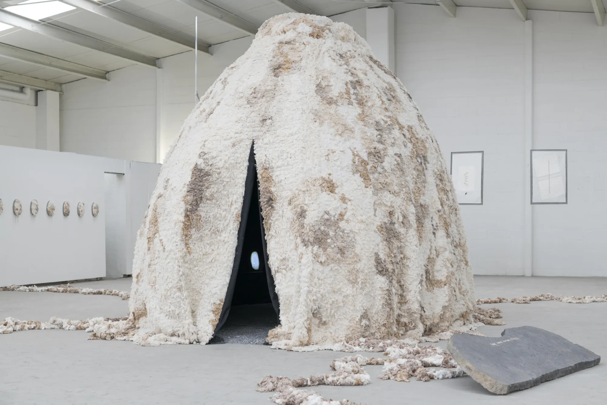 Sara Kieffer & Lucien Woodtli - Kieffer Woodtli, Cave, AXES, Alvarez Chida, Mexico City, 2026, large dome form in crystallized textile with narrow entrance slit