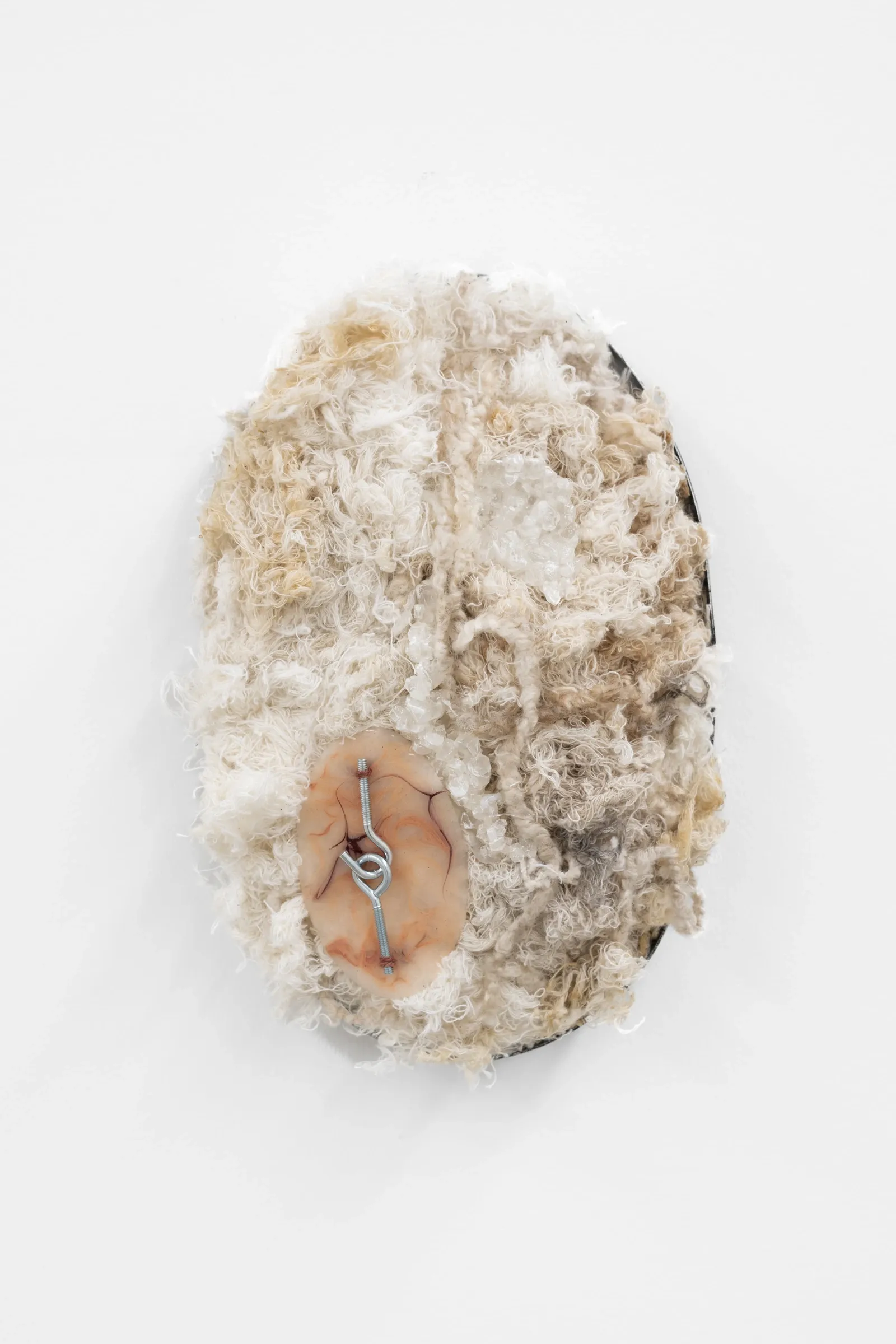 KiefferWoodtli, Index, AXES, Alvarez Chida, Mexico City, 2026, oval wall-mounted textile relief with raw fiber surface and central metal hook