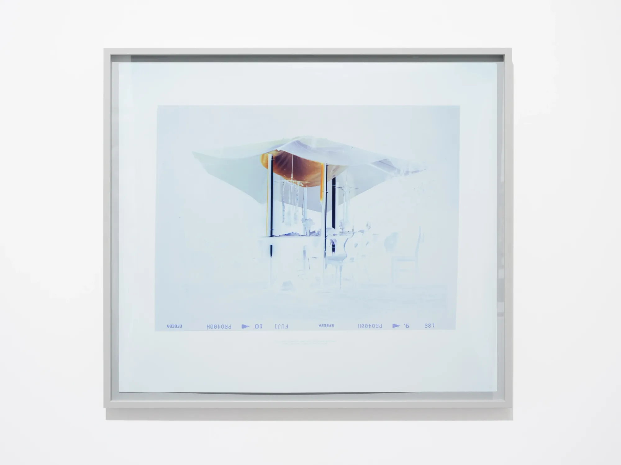 Laurynas Skeisgiela, Liump! Fitness?, Vartai Gallery, Vilnius, 2026, framed overexposed C-print of Heuriger wine table setting