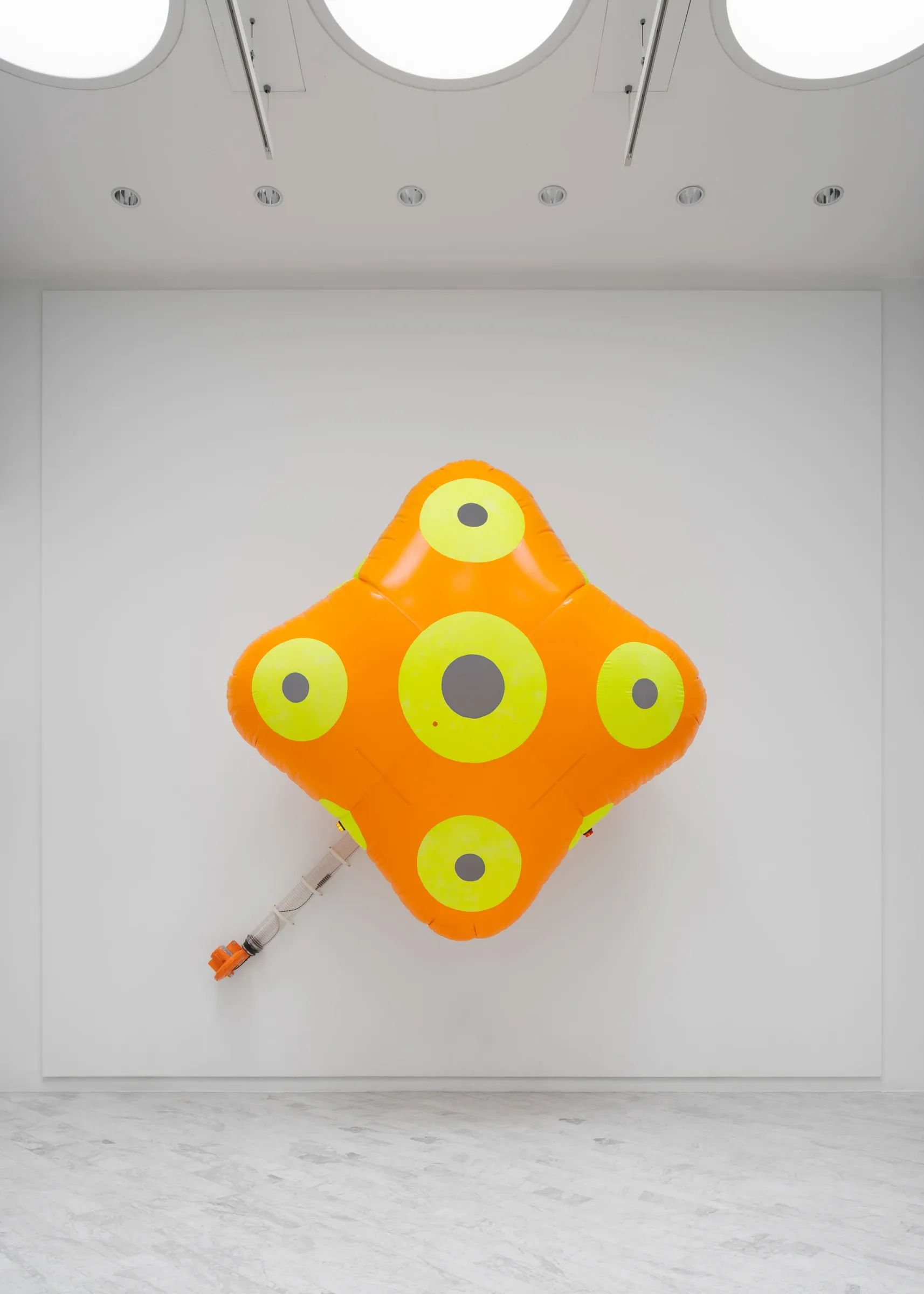 Louis Morlæ, Walls at the World's End, Tranen, Hellerup, 2026, detail of orange airbag with yellow-green reflective panels and inflation hose