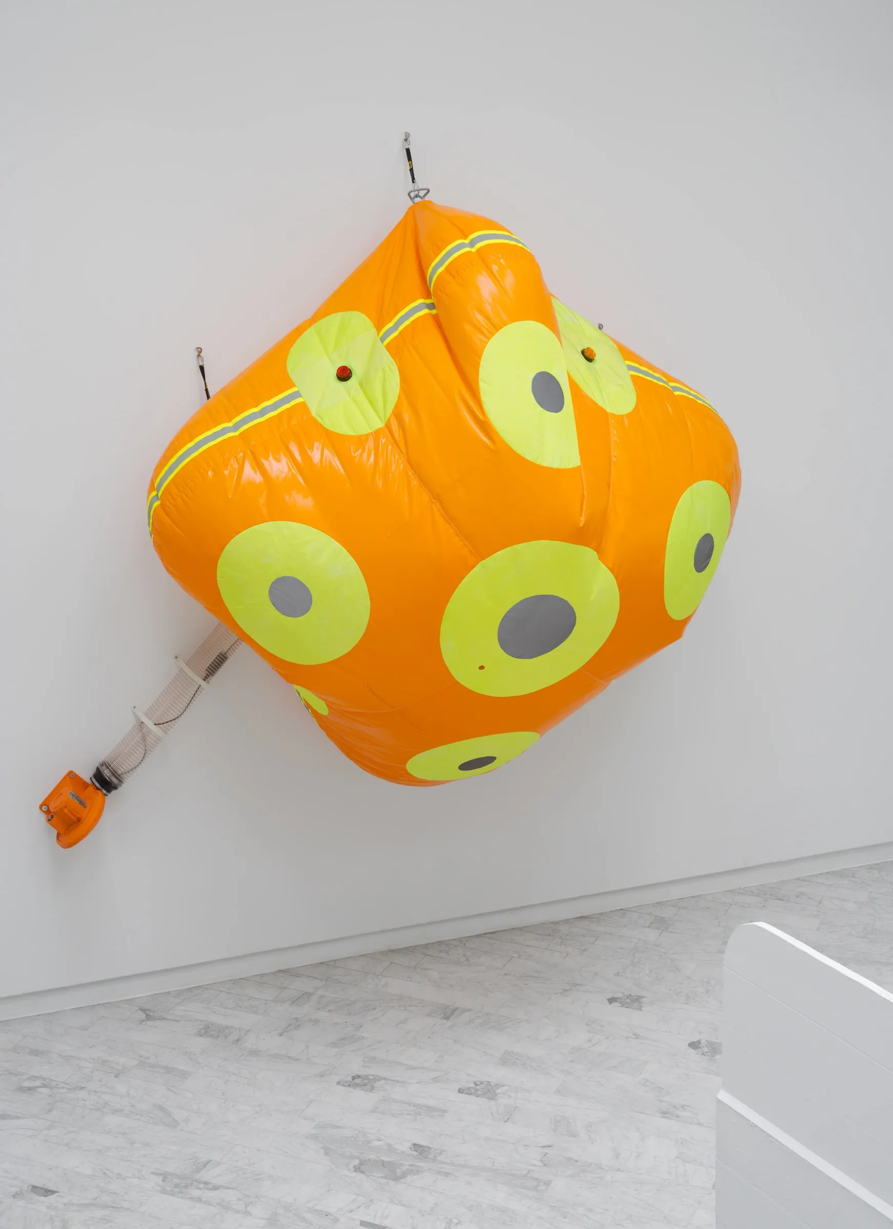 Louis Morlæ, Walls at the World's End, Tranen, Hellerup, 2026, detail of fully inflated orange airbag surface and mounting hardware