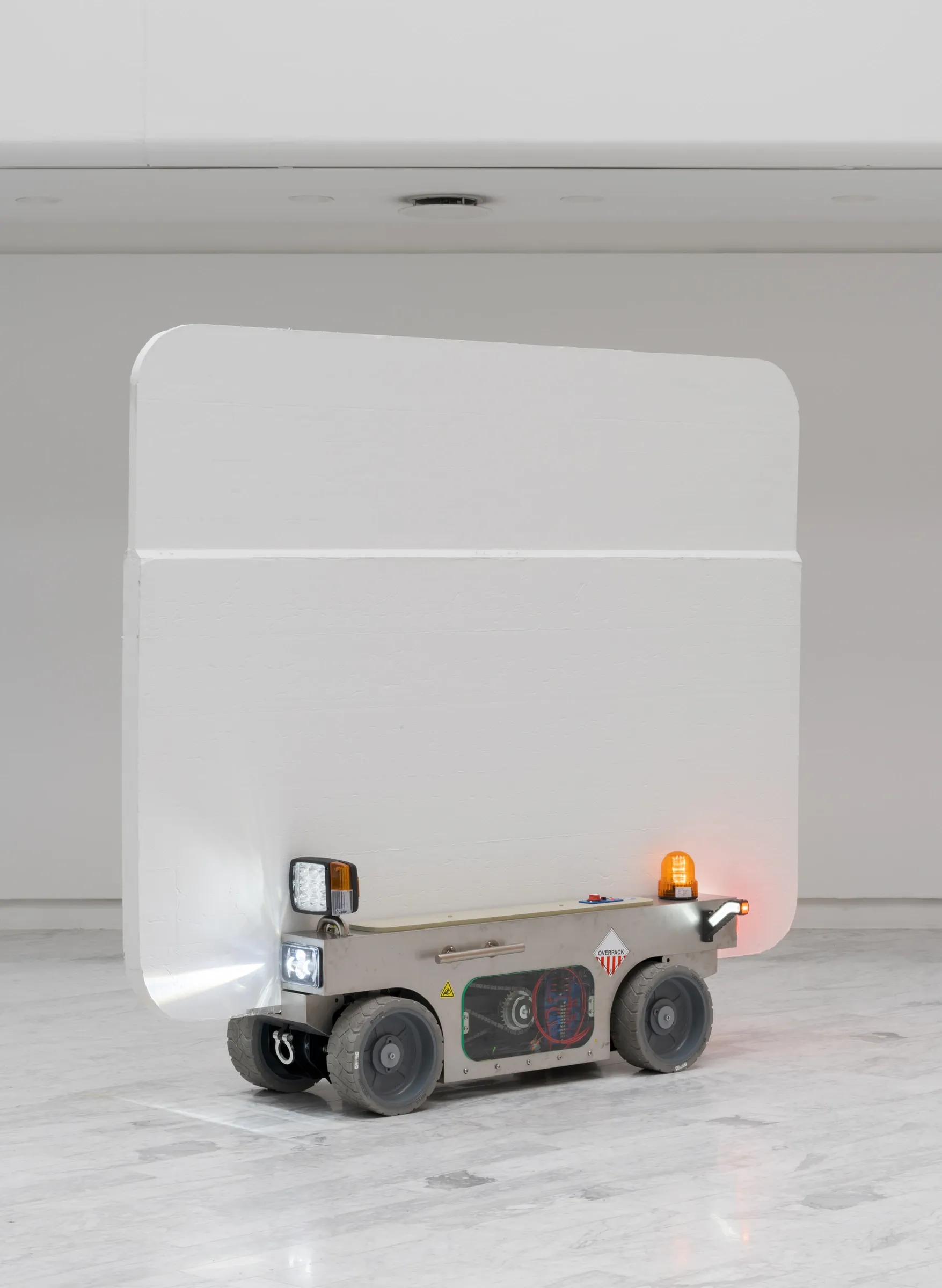 Louis Morlæ, Walls at the World's End, Tranen, Hellerup, 2026, robotic wall vehicle close-up with headlights and warning beacon