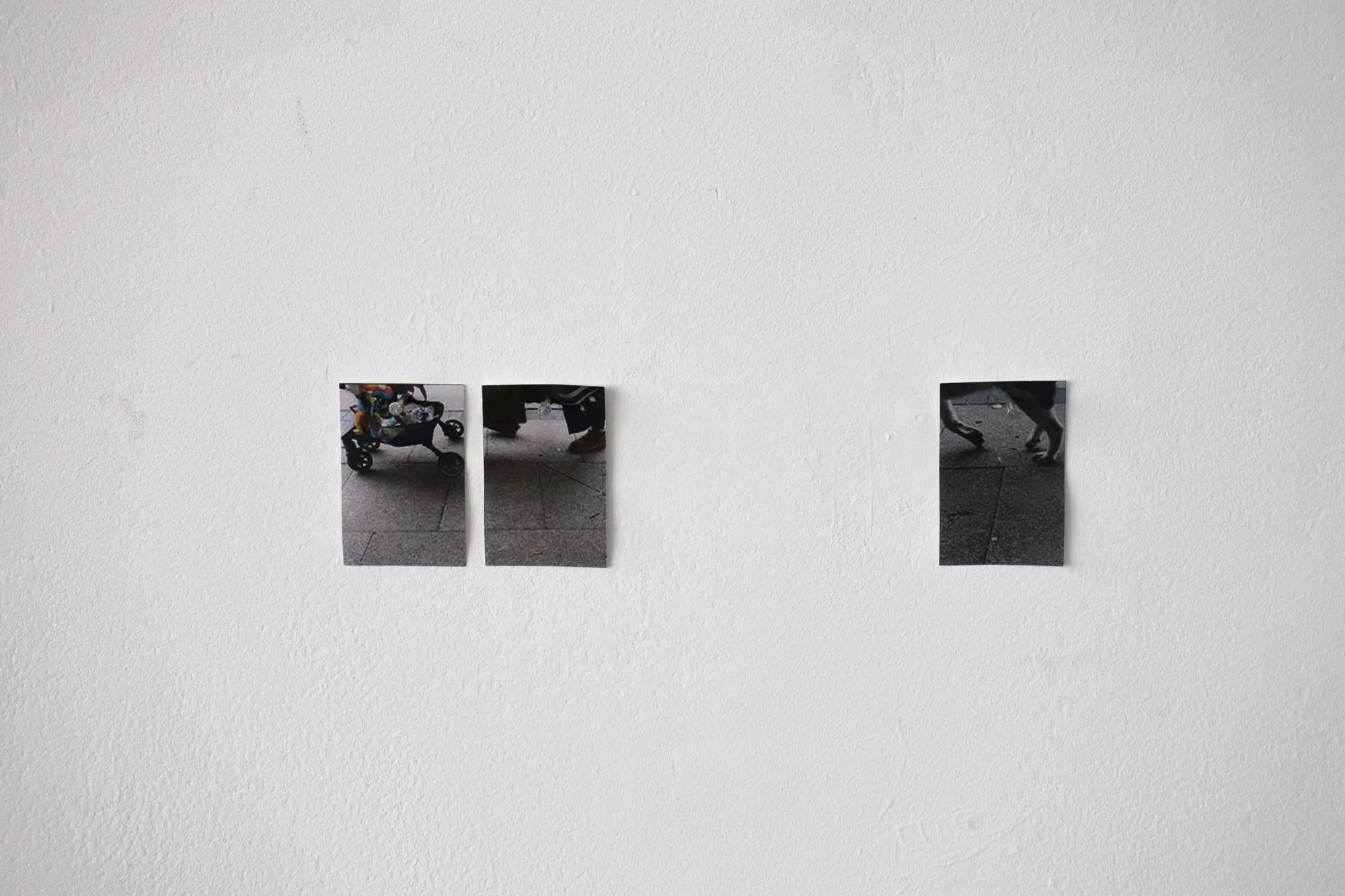Min Jeong Park, Footsteps at the Forecourt of the Peckham's Pelican Estate, three photographs on white wall, 2025