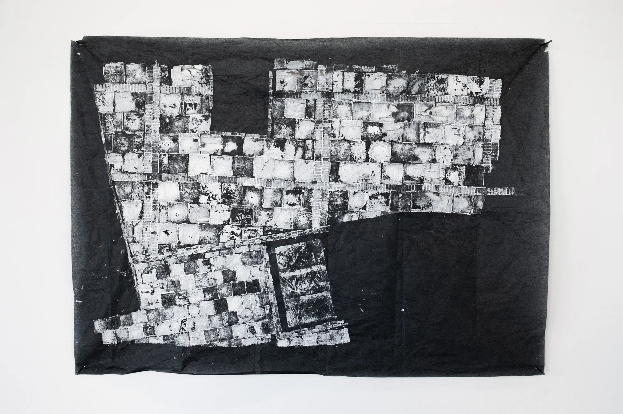 Min Jeong Park, The Pavement at the Forecourt of the Peckham's Pelican Estate, rubbing on black textile, 2025