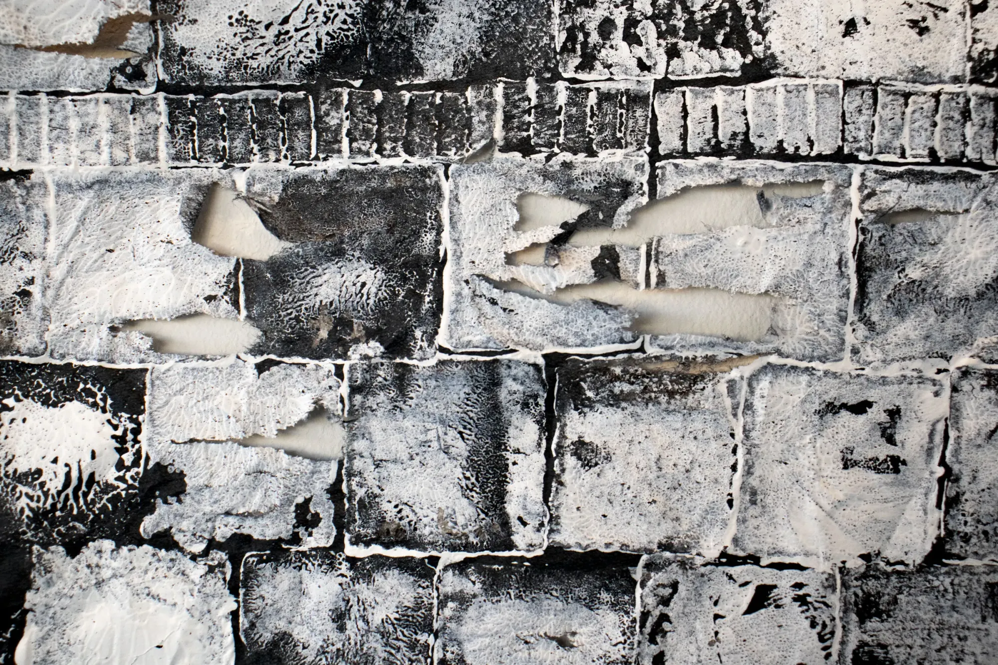 Min Jeong Park, The Pavement at the Forecourt of the Peckham's Pelican Estate, detail, wax rubbing on black textile, Pelican Estate Peckham, 2025