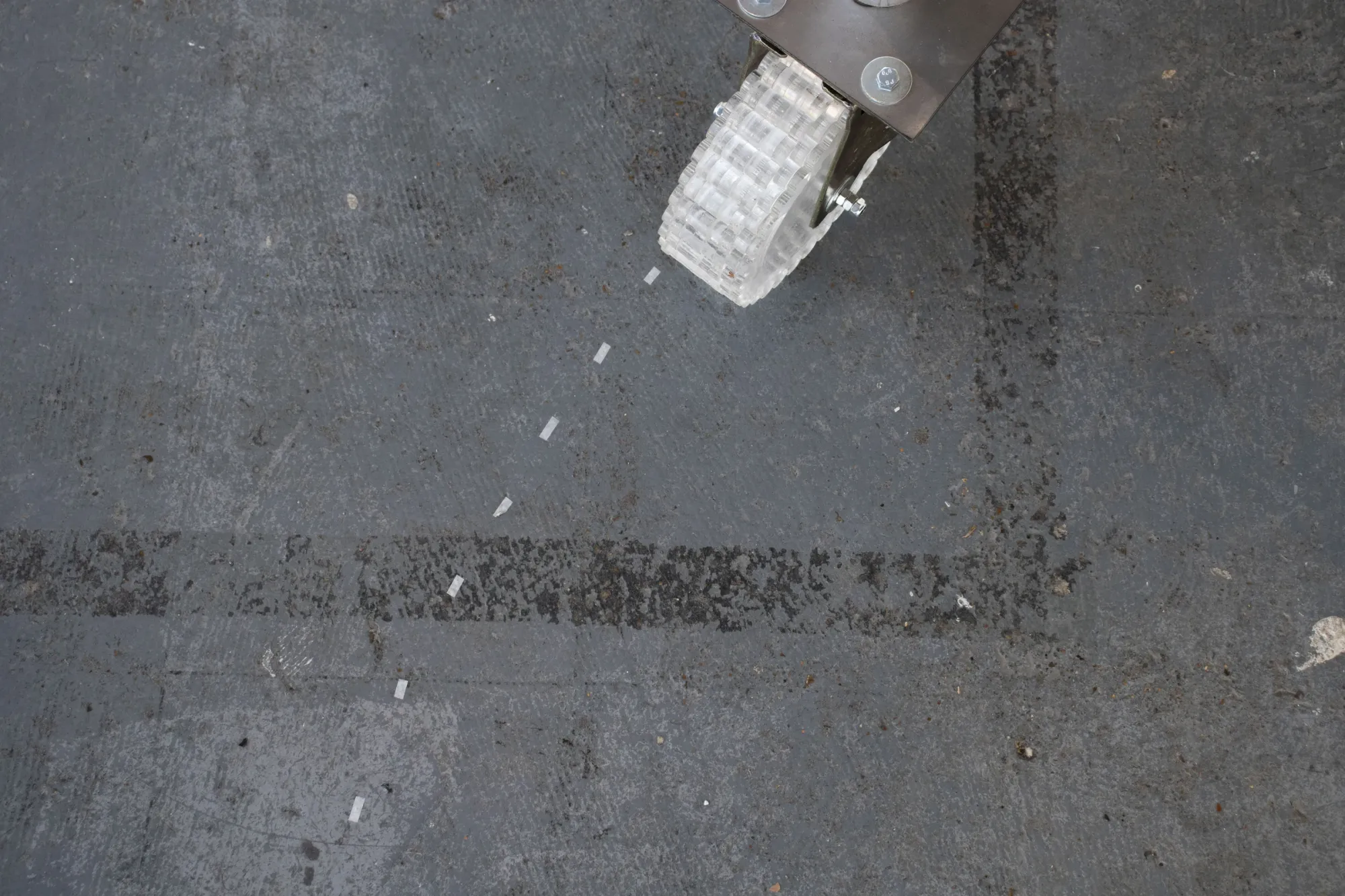 Min Jeong Park, Wheeled Bench, chalk trace on concrete gallery floor, AMP Gallery, 2025