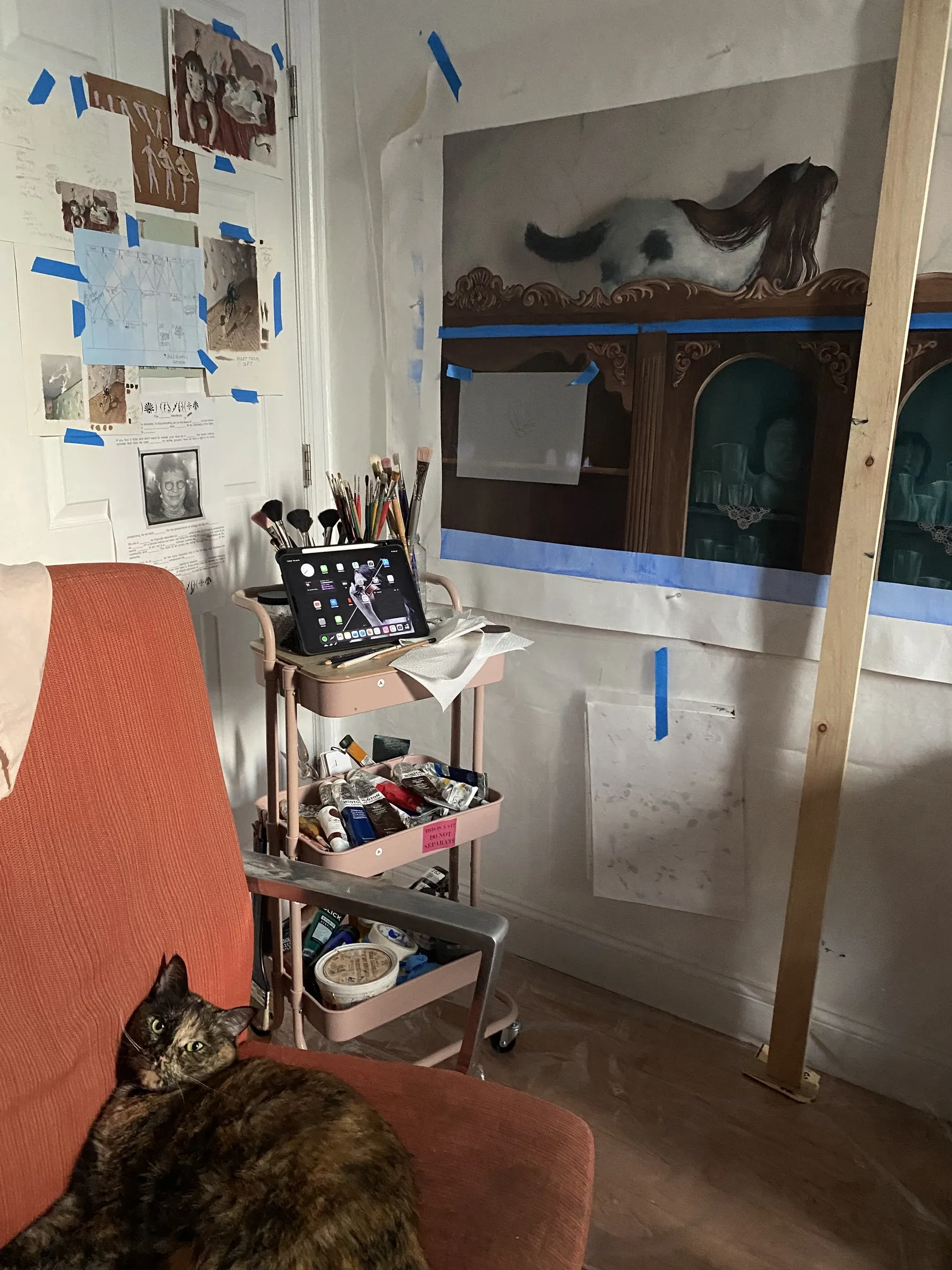 Rei Xiao studio Brooklyn 2025, Youve been Turked canvas in progress on wall with reference materials and cat on couch
