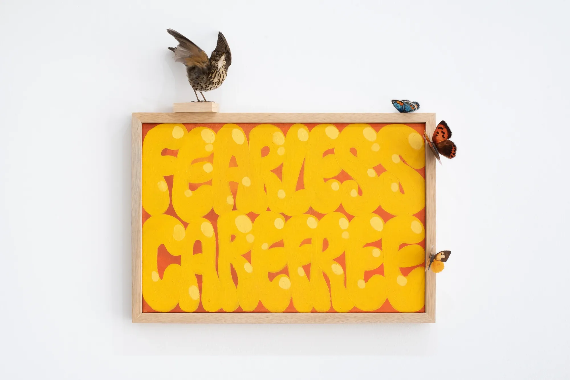 Yeti, Fearless and Carefree, 2026, oil and mixed media with taxidermy thrush and pinned butterflies on wood-framed canvas, The Edit Gallery, Limassol