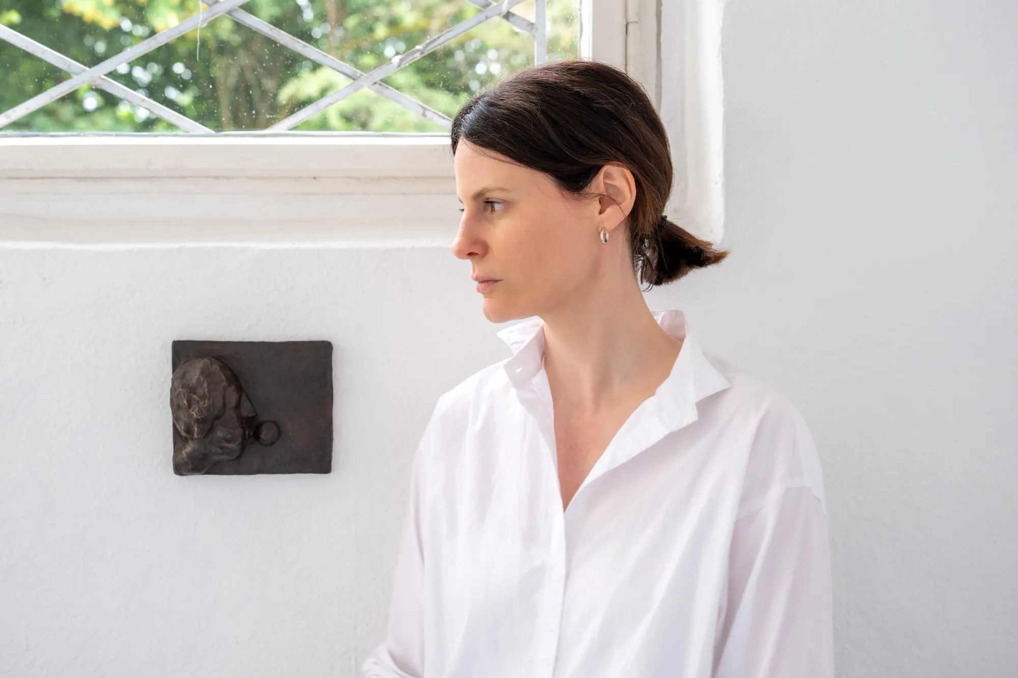 Charis Judith Smith, We Are Being Carried Somewhere, studio, Berlin, 2026, portrait of the artist in her studio