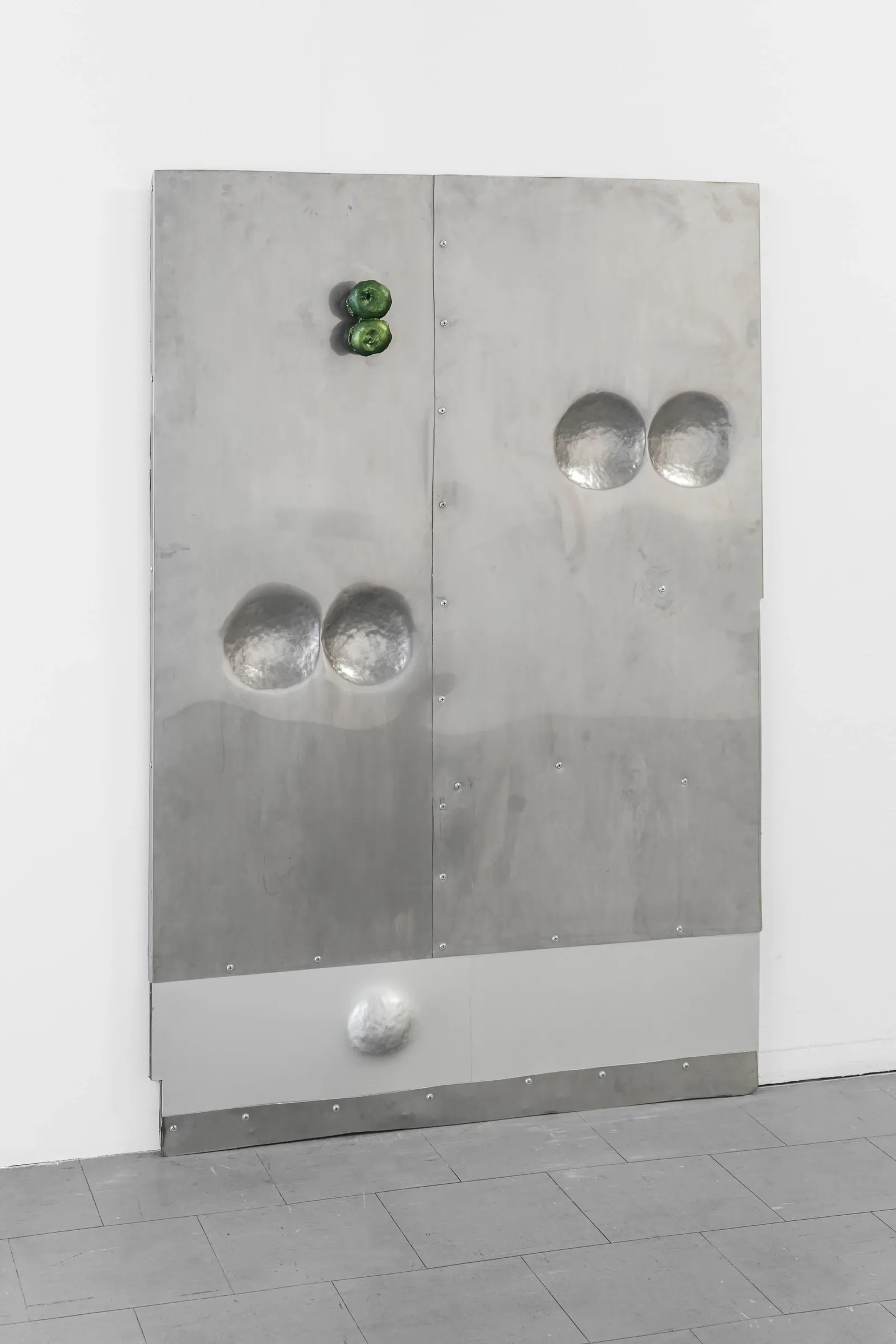 Matti Sumari, We can't sing but we do, Skånes konstförening, Malmö, 2026, detail of steel panel with hammered dome forms