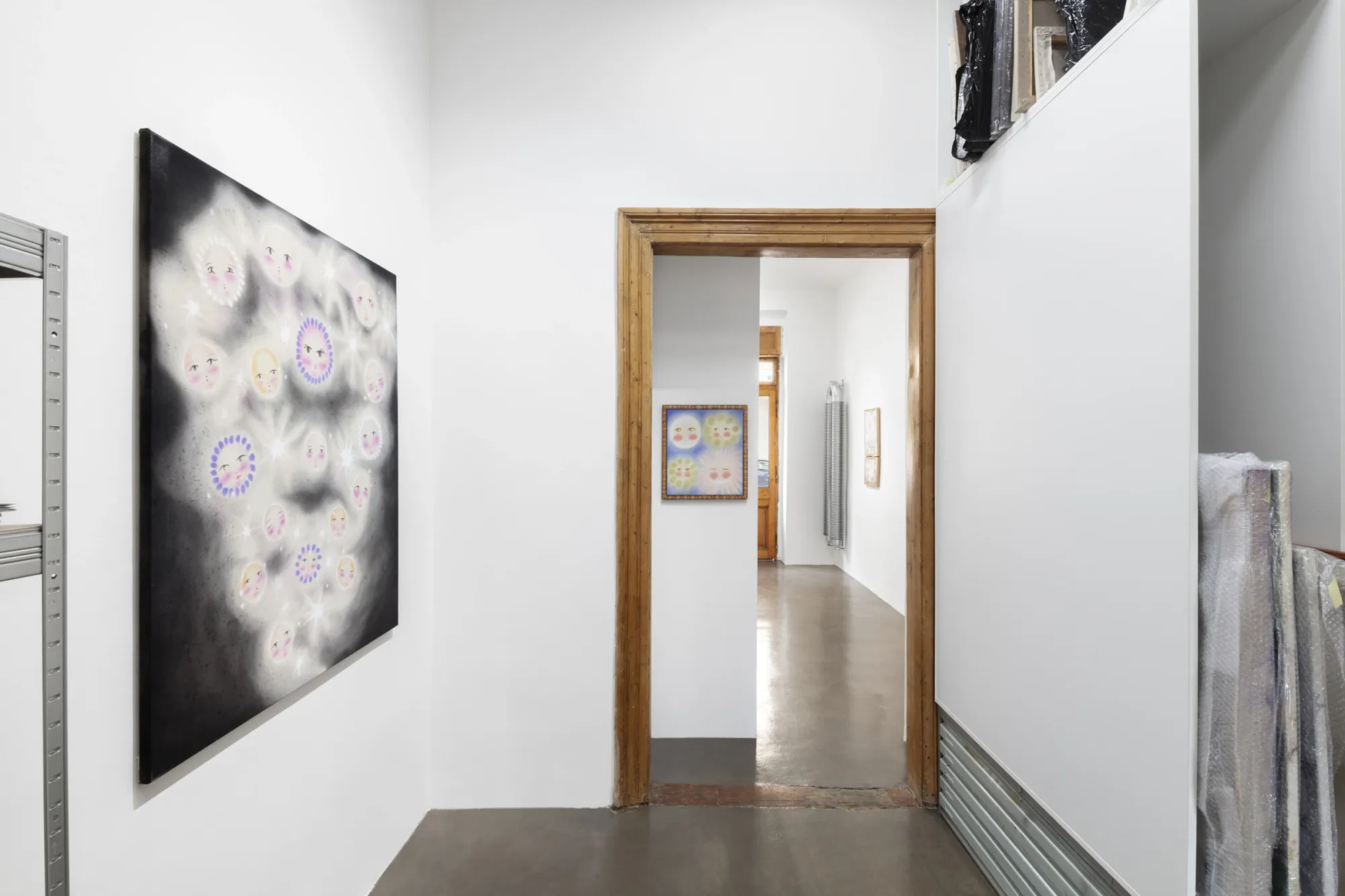 Olga Krykun, Stardust for Tomorrow, Clauda, Prague, 2026, square canvas with small faces ringed in light on a dark ground