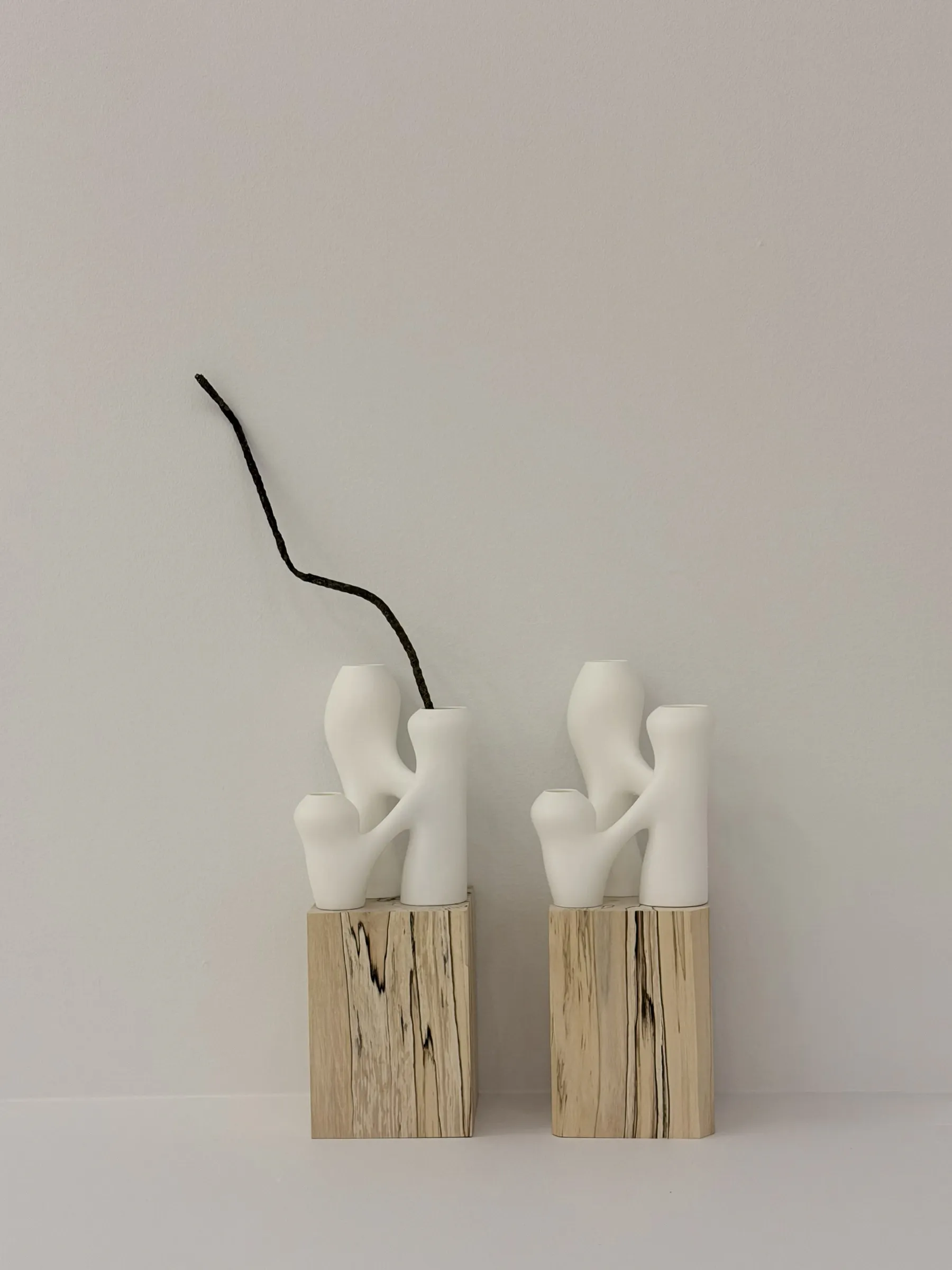 Patrick Bérubé, Communicating Vessels, (Ce)pendant [(Now)ever], Musée d'art de Joliette, 2026, paired vessel forms on wood blocks