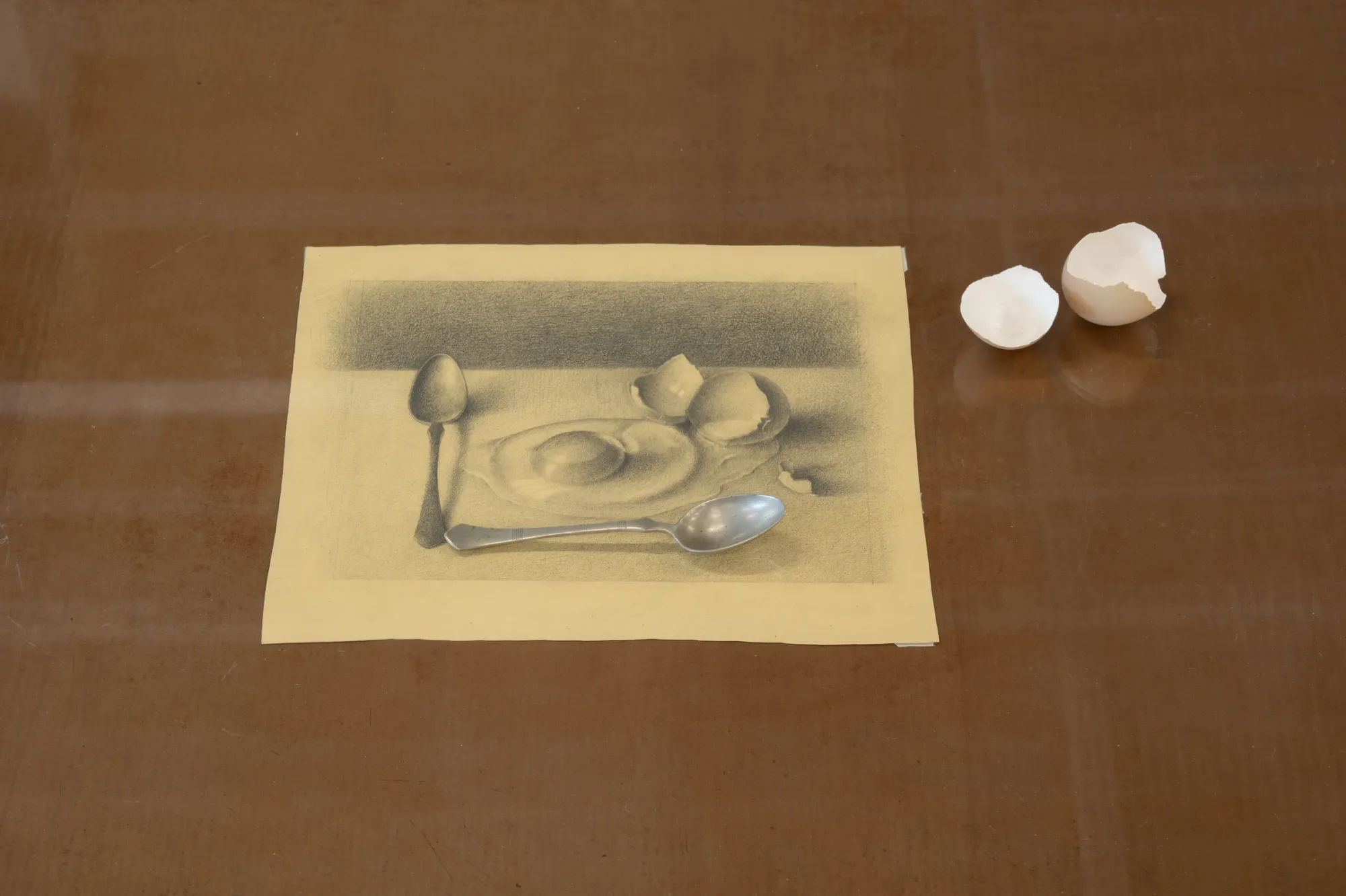 Exhibition review of Roman Ondak: Signal V at Telegraph Gallery, Olomouc, 2026. Close-up detail of eggshell halves beside a graphite drawing of a spoon and eggs.