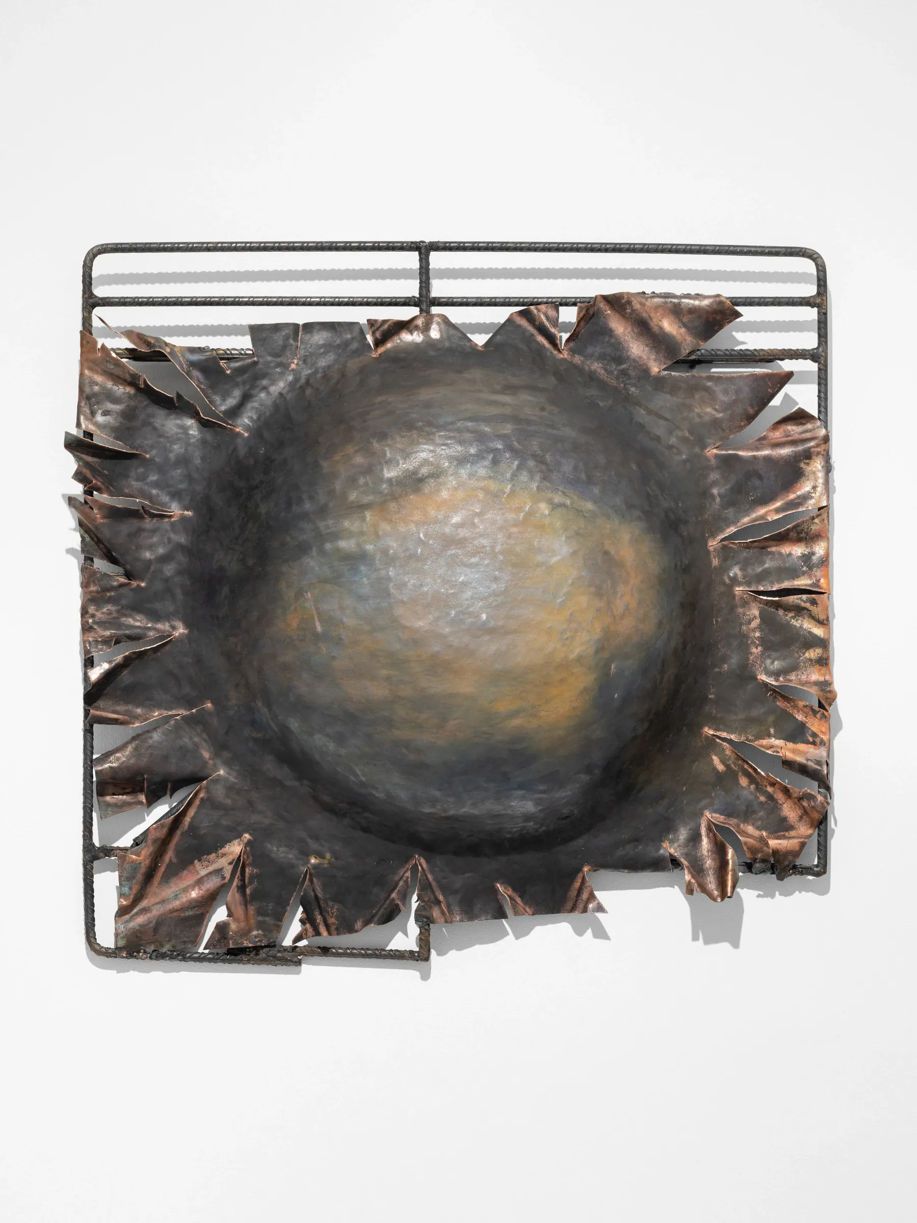 Miłosz Tomkowicz, Sun, HOS Gallery, Warsaw, 2026, copper and concrete disc set in a steel reinforcement frame