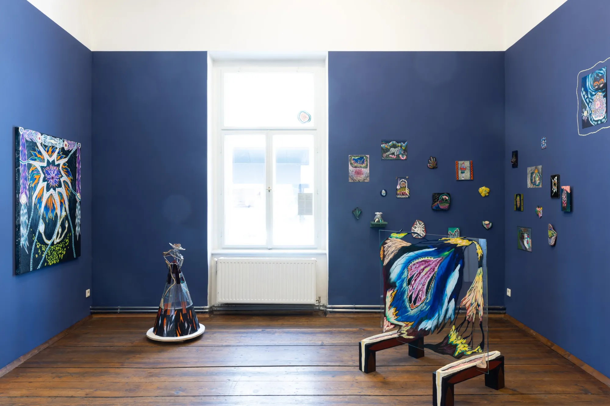 Vanja Krajnc, A Parable for Endings and Beginnings, rotor, Graz, 2026, paintings and glass objects in blue gallery room