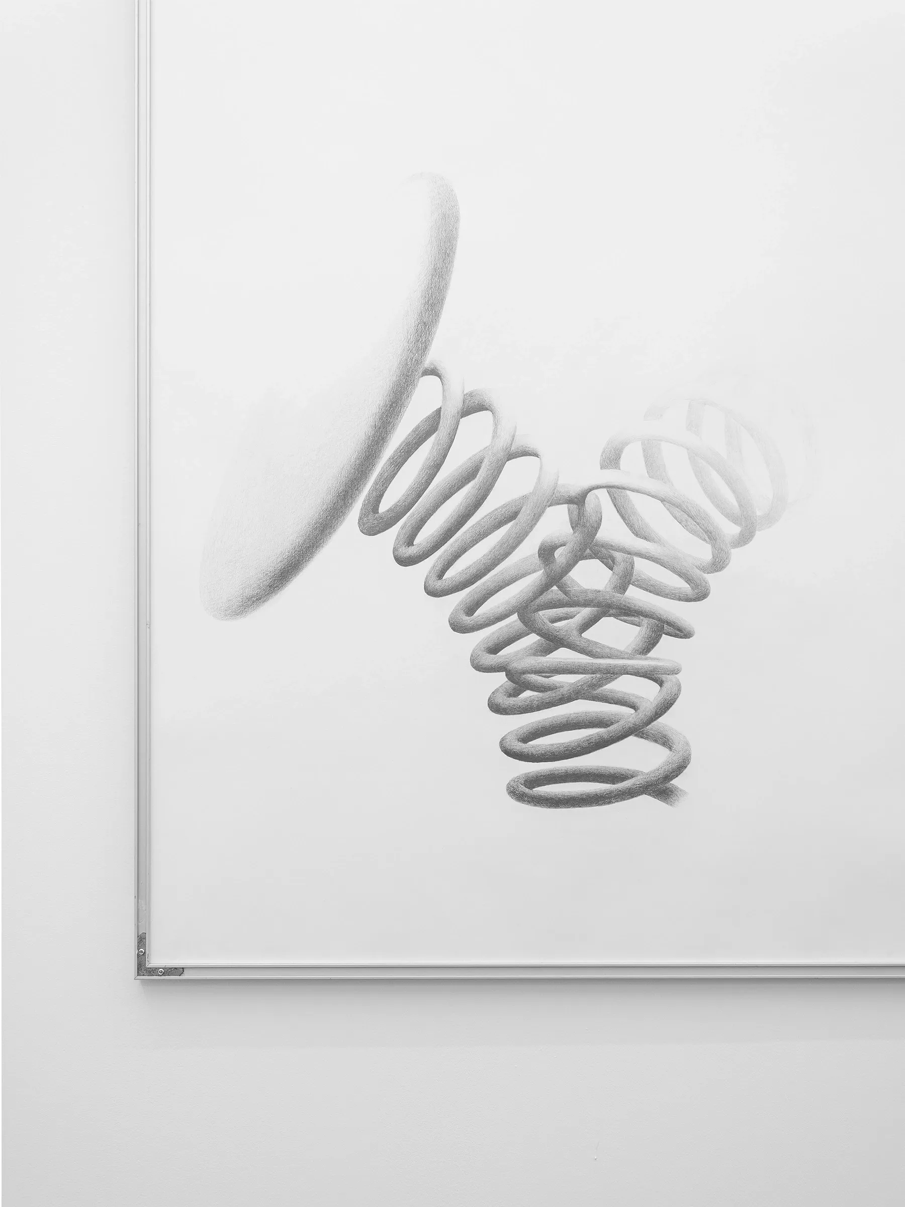 Exhibition review of Emilio Marroquin: Homeless Musically at Emergency Space, Paris, 2026. Charcoal drawing of coiled springs hung backward in its frame on a white wall.Charcoal drawing of coiled springs hung backward in its frame on a white wall.