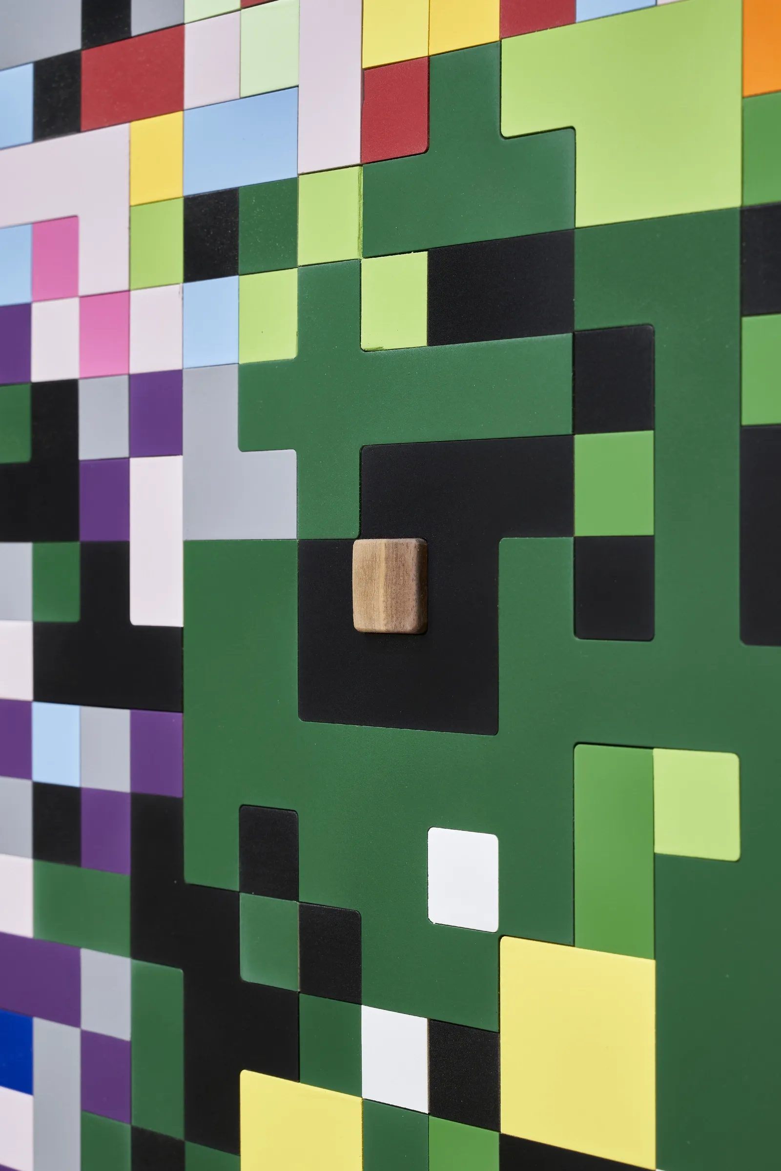 aebum Joo, studio practice and artwork at Hakgojae Gallery, Seoul, 2026. Close-up of green and black wood blocks around a raised wood knob.