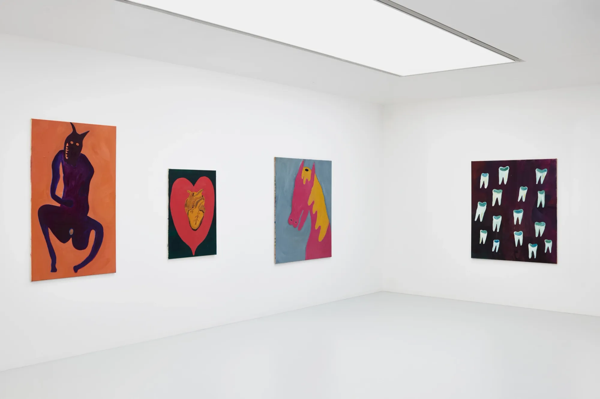 Catapult Contemporary Exhibition review of Kallirroi Ioannidou: Galvanizing Memories at Kallmann-Museum, Ismaning, 2026. Gallery wall with four paintings, a crouched purple devil figure, a pink and yellow horse head, and a dark canvas covered in rows of painted teeth.
